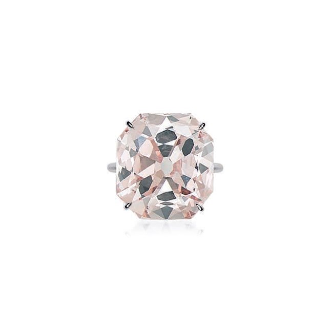 A CHARMING COLOURED DIAMOND RING