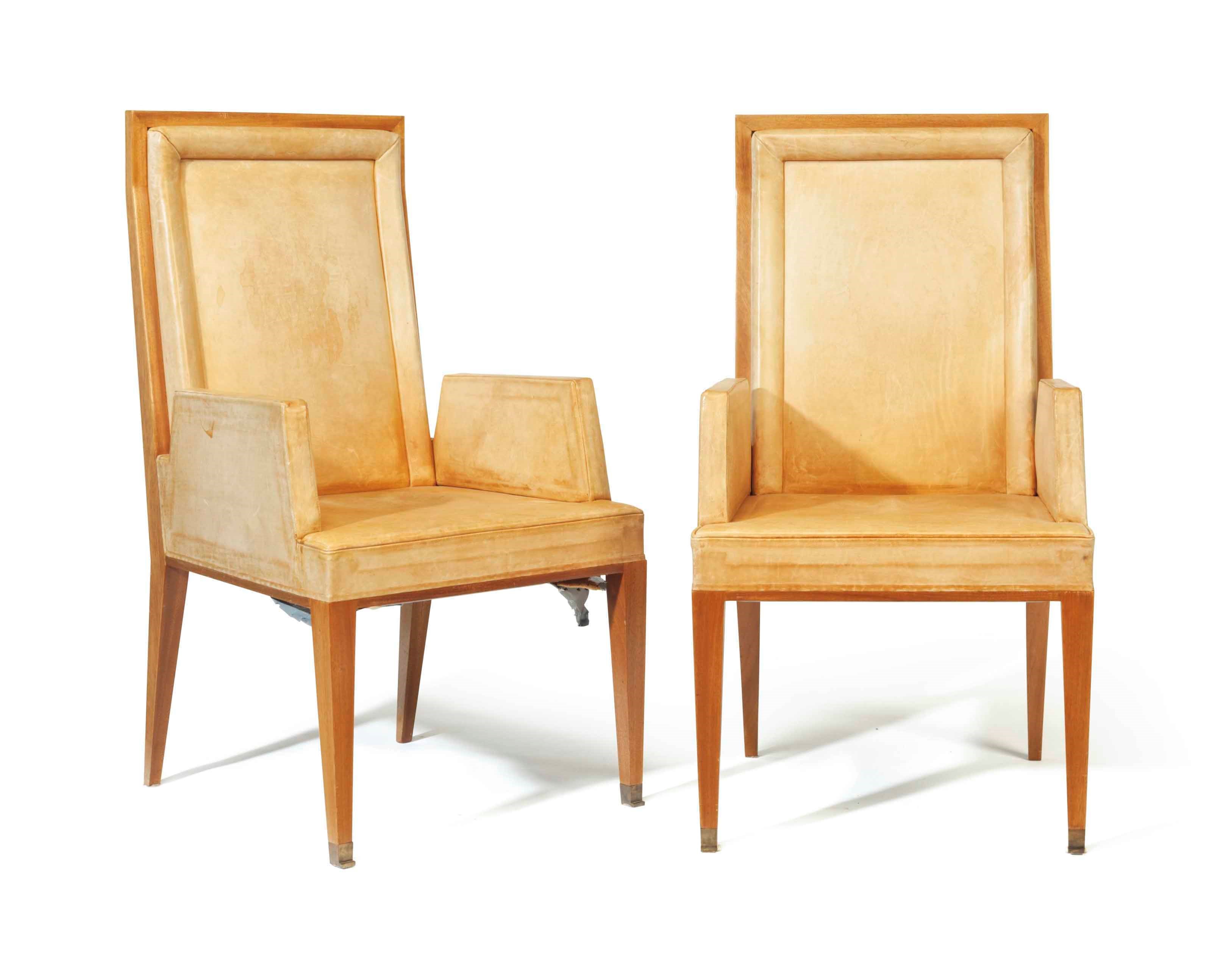 A PAIR OF FRENCH CHERRY AND LEATHER-UPHOLSTERED ARMCHAIRS