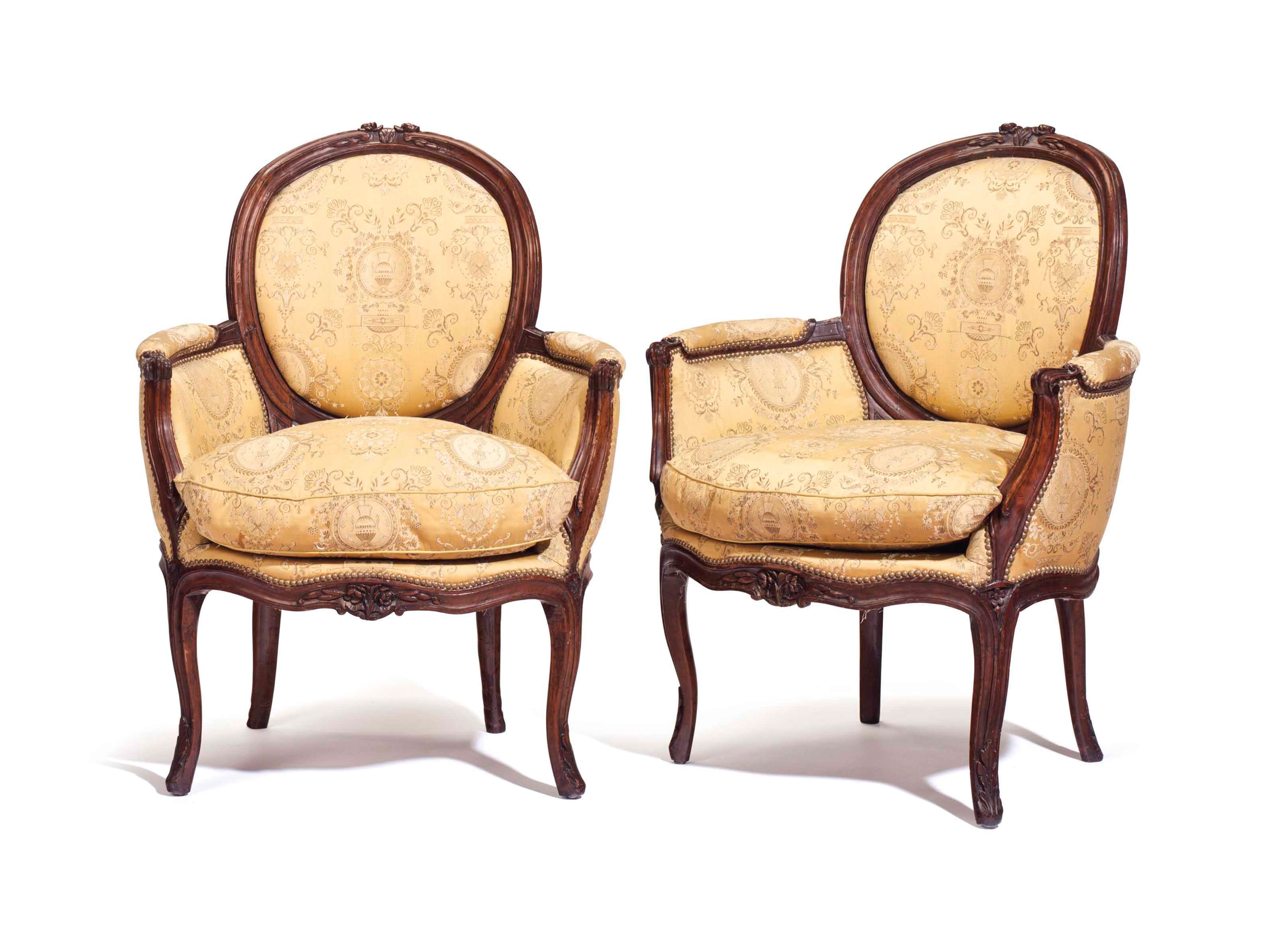 A PAIR OF LOUIS XV WALNUT BERGERES