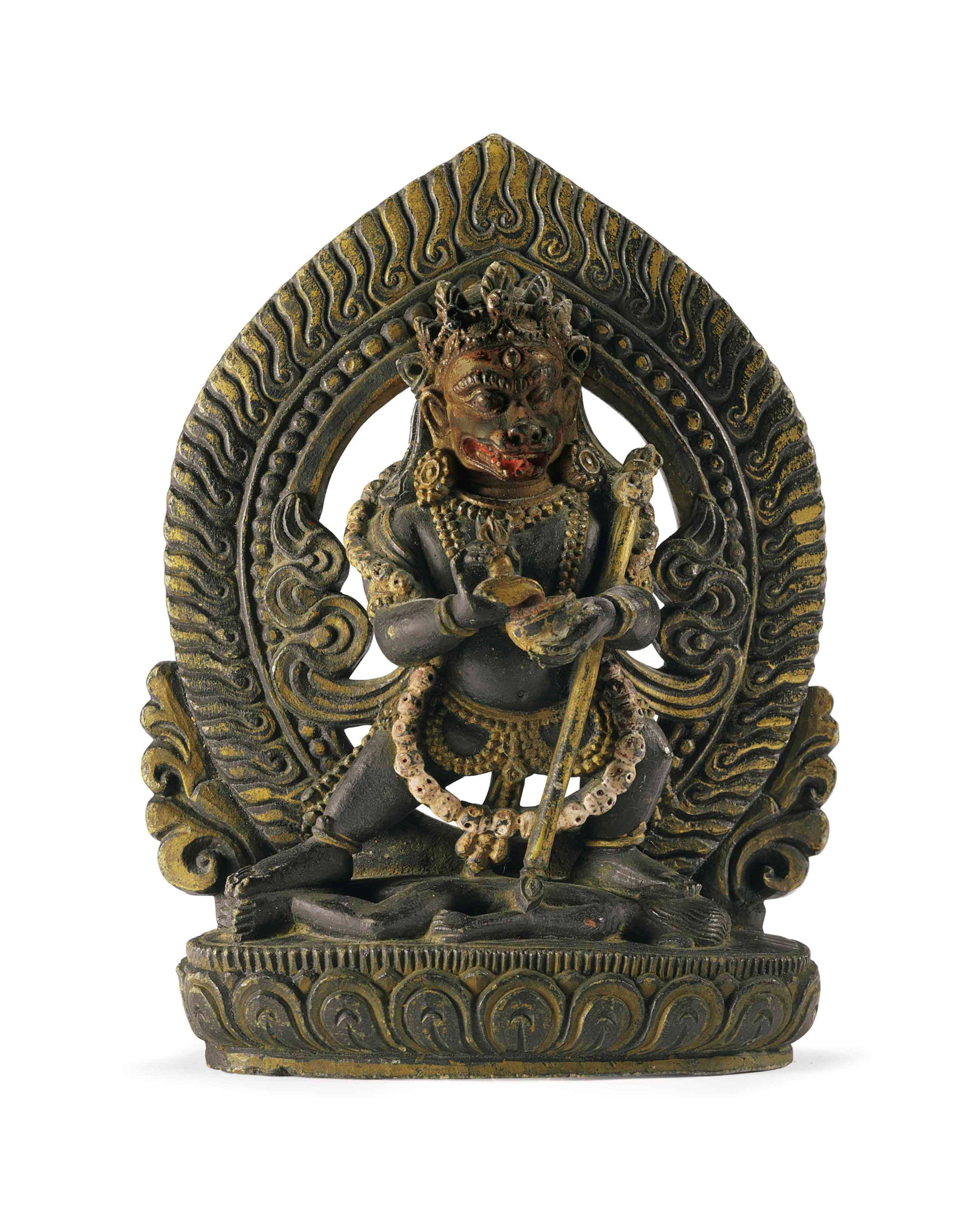 A Polychromed Black Stone Figure of a Dakini, possibly Simhamukha