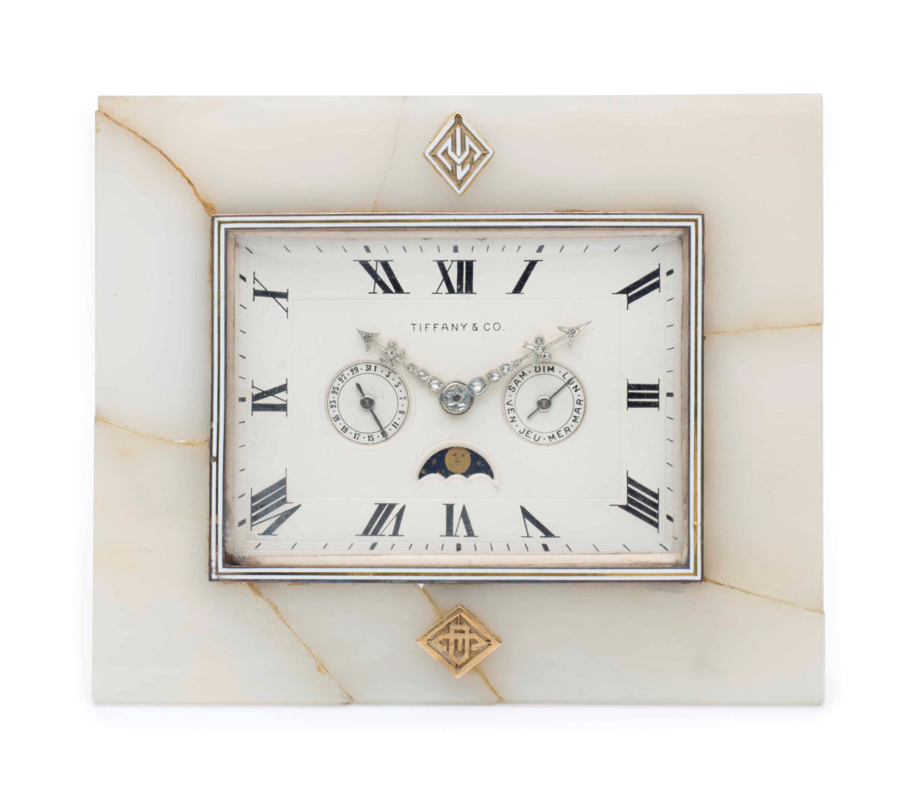 AN AMERICAN WHITE QUARTZ AND DIAMOND DESK CLOCK
