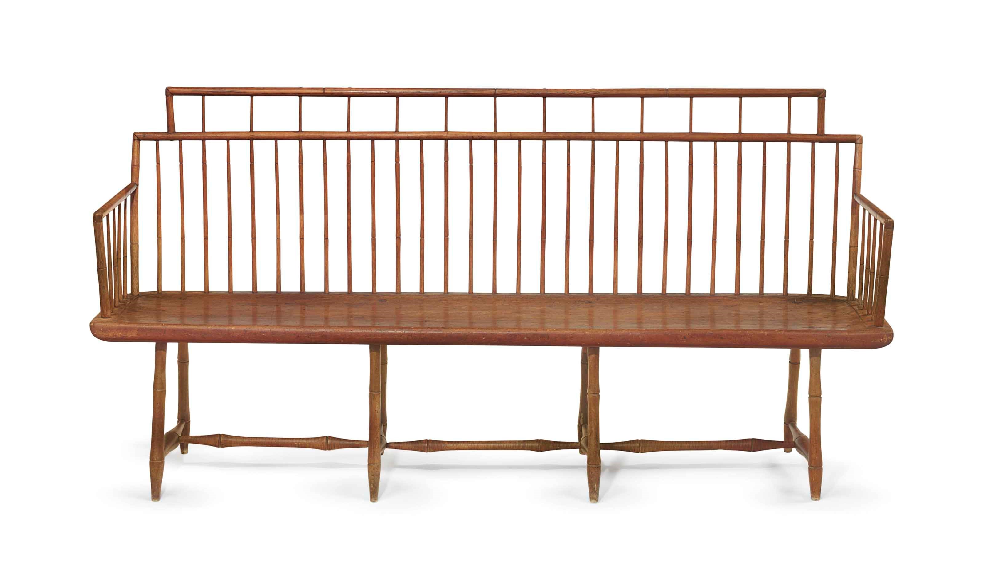 A FAUX-BAMBOO TURNED ROD-BACK WINDSOR SETTEE
