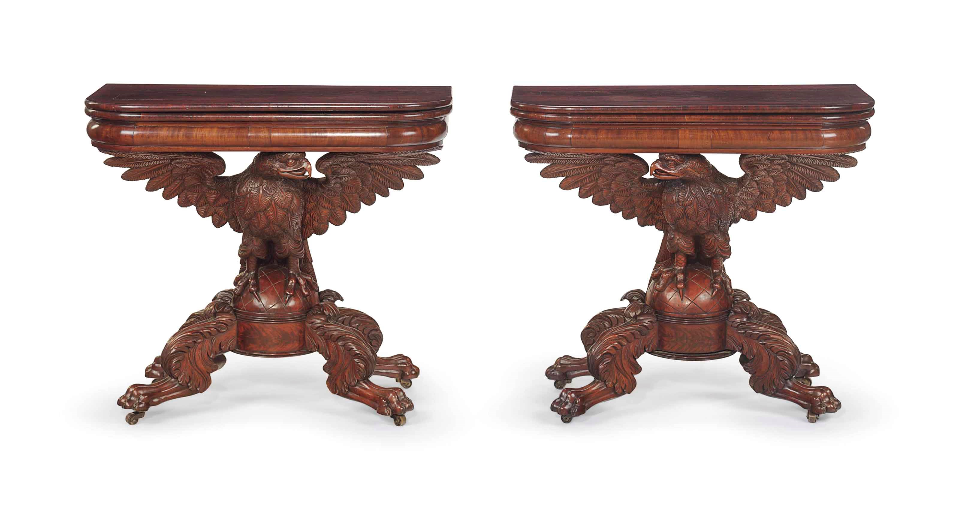 A PAIR OF CLASSICAL CARVED MAHOGANY EAGLE-BASE CARD TABLES