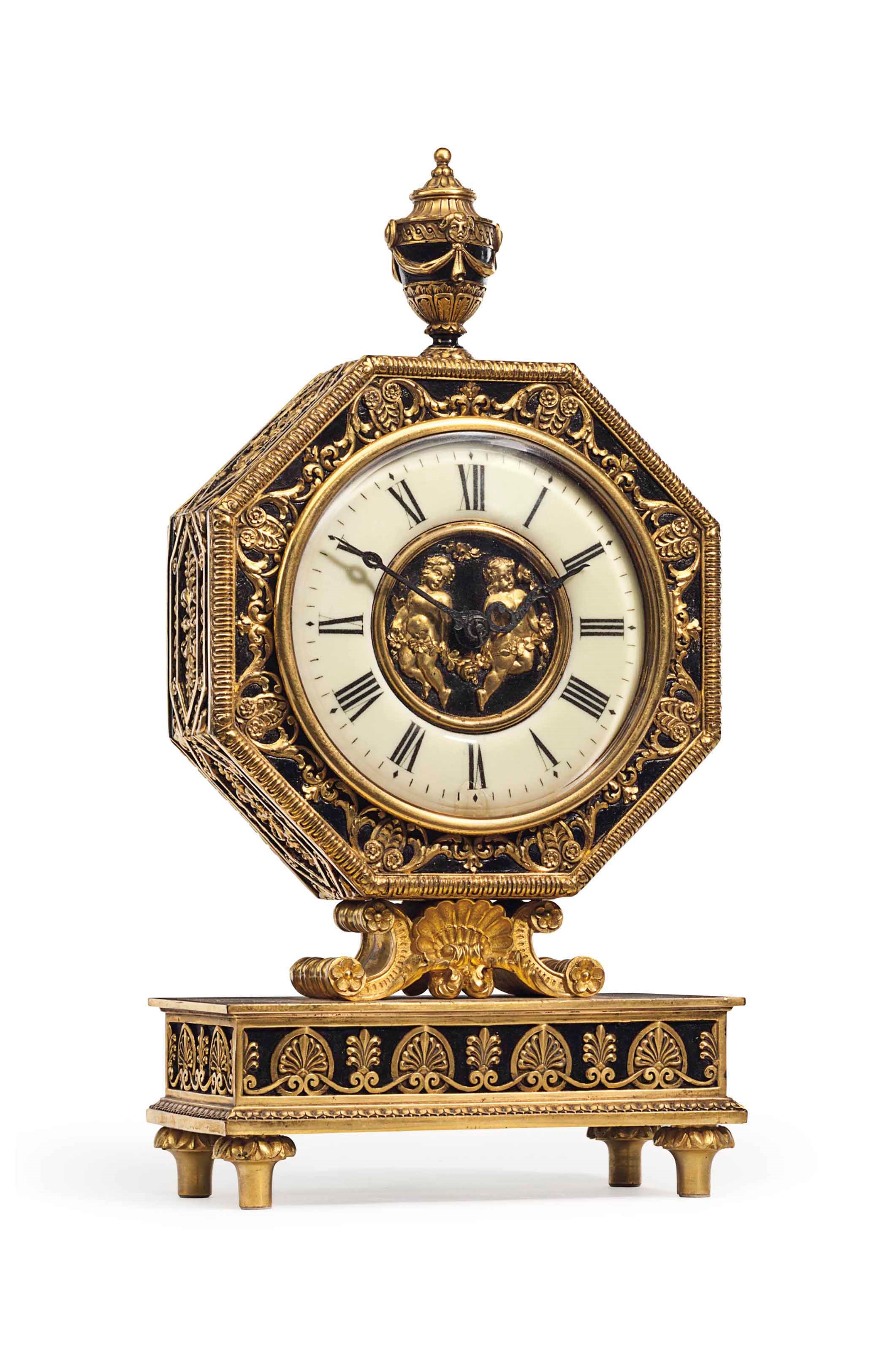 AN AMERICAN GILT AND PATINATED BRONZE TABLE CLOCK
