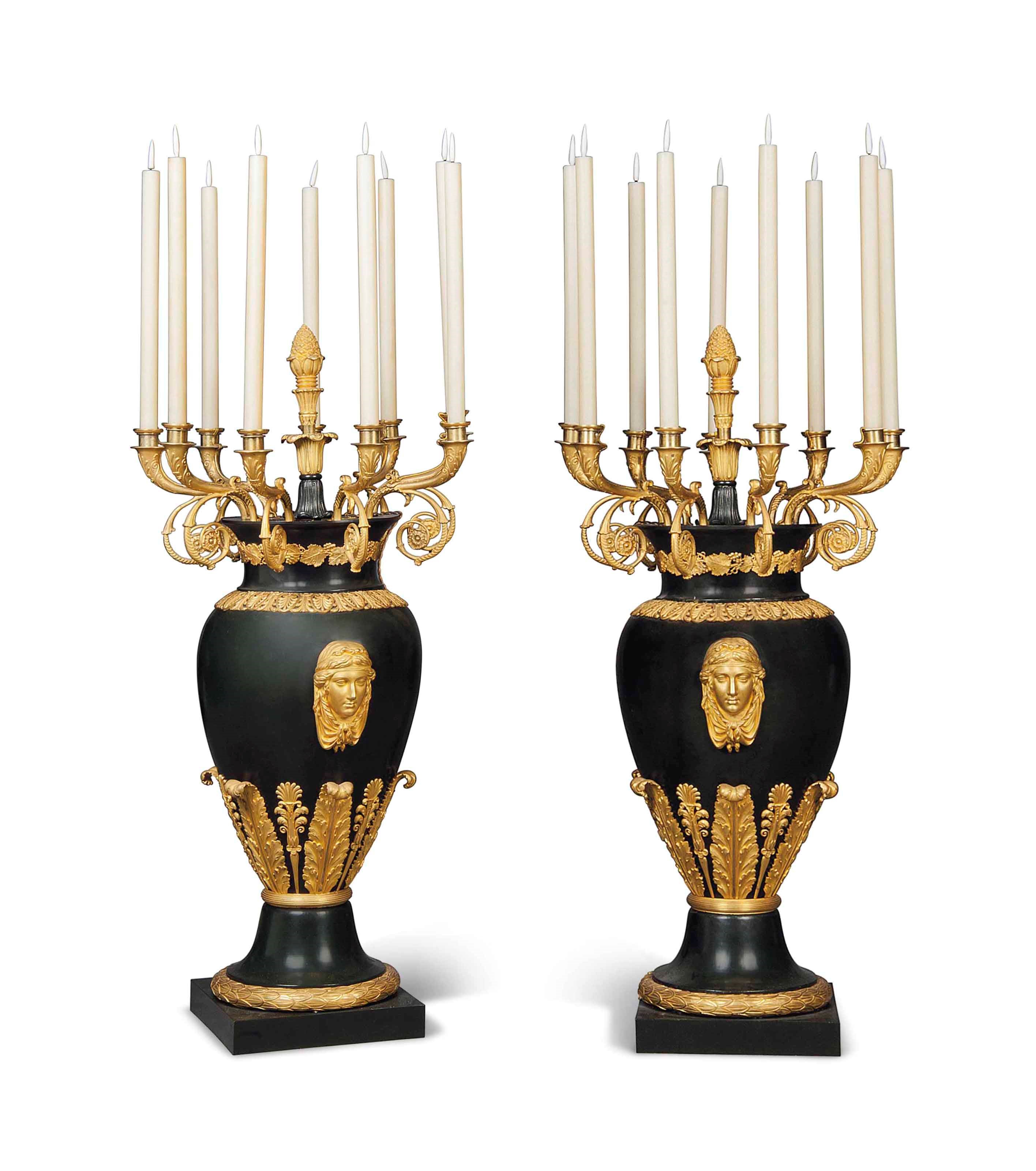 A PAIR OF FRENCH ORMOLU AND PATINATED-METAL NINE-BRANCH CANDELABRA