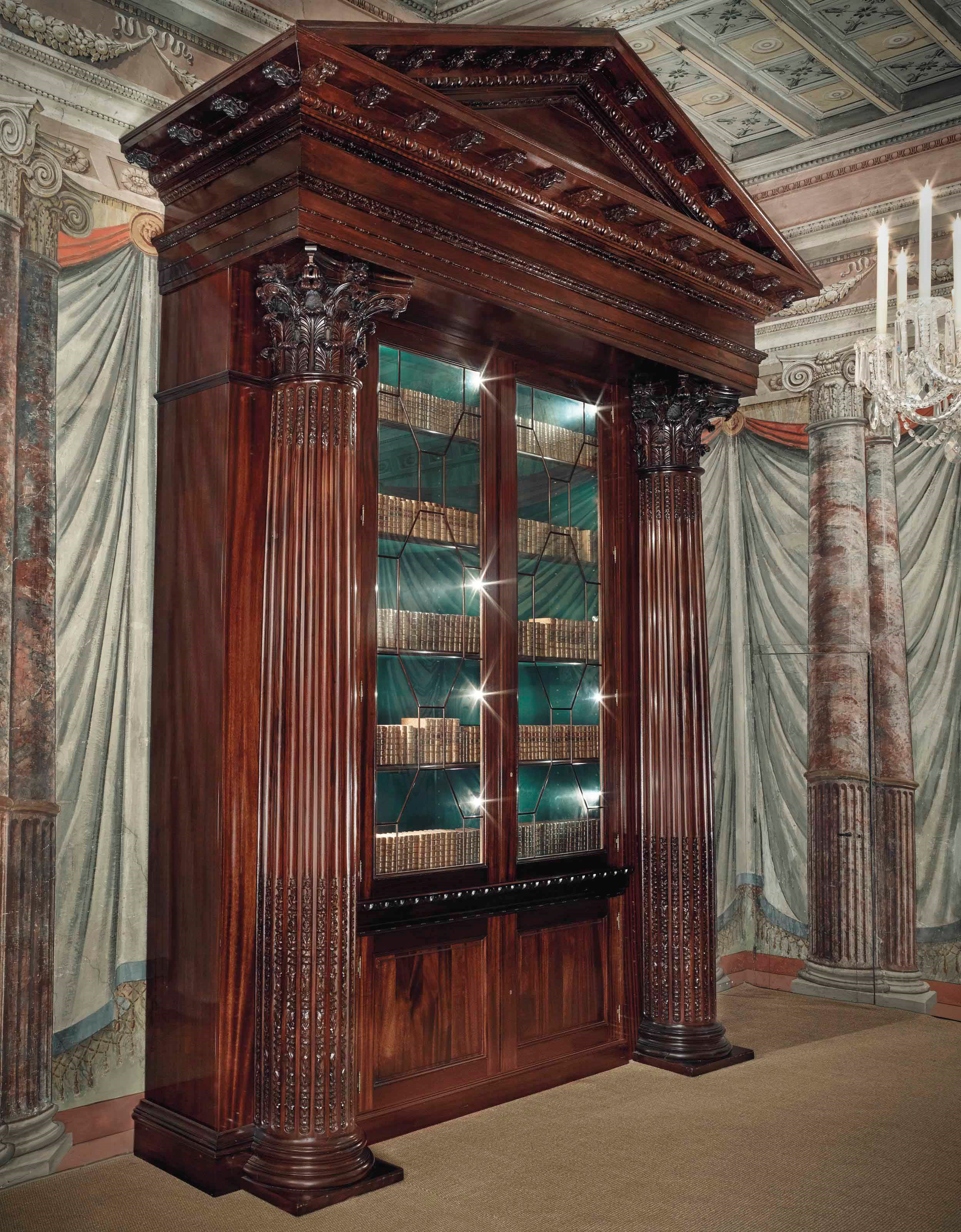 A MONUMENTAL MAHOGANY BOOKCASE