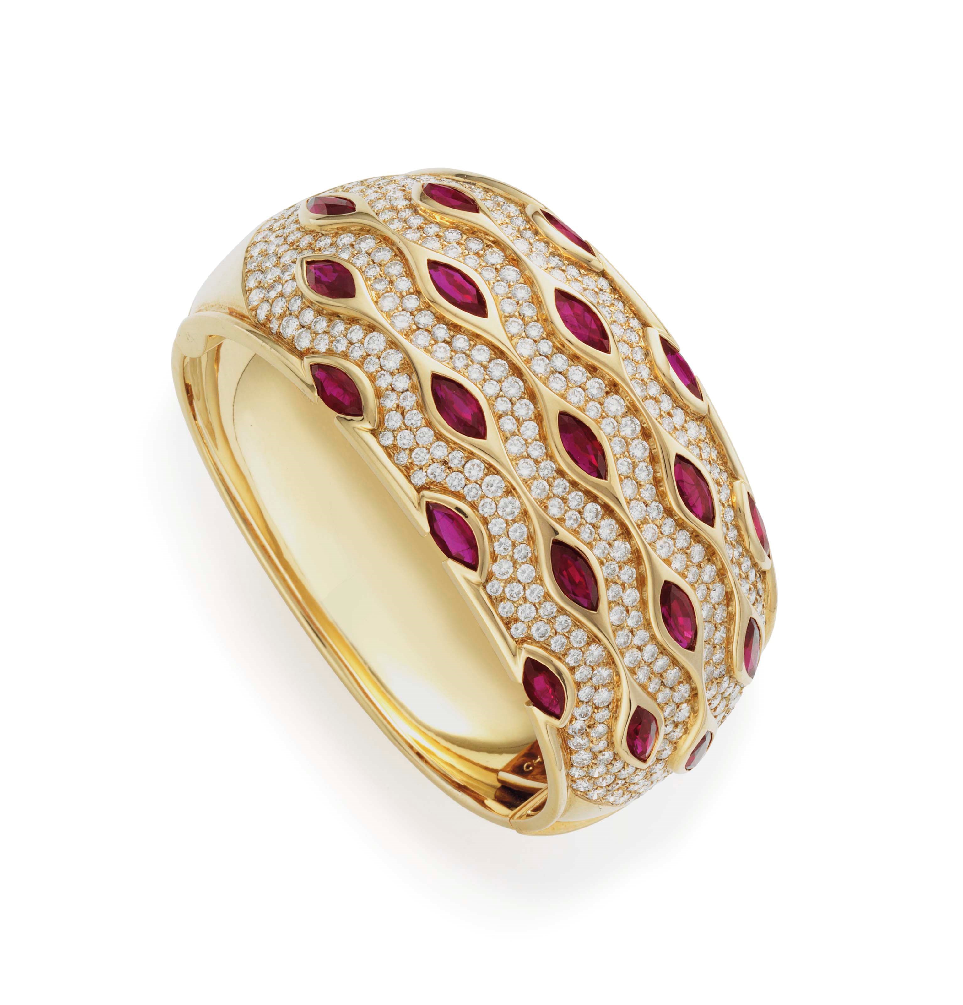 A RUBY, DIAMOND AND GOLD BANGLE BRACELET, BY CHAUMET