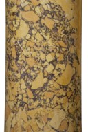 A SET OF FOUR REGENCY SCAGLIOLA 'SIENA MARBLE' IONIC COLUMNS