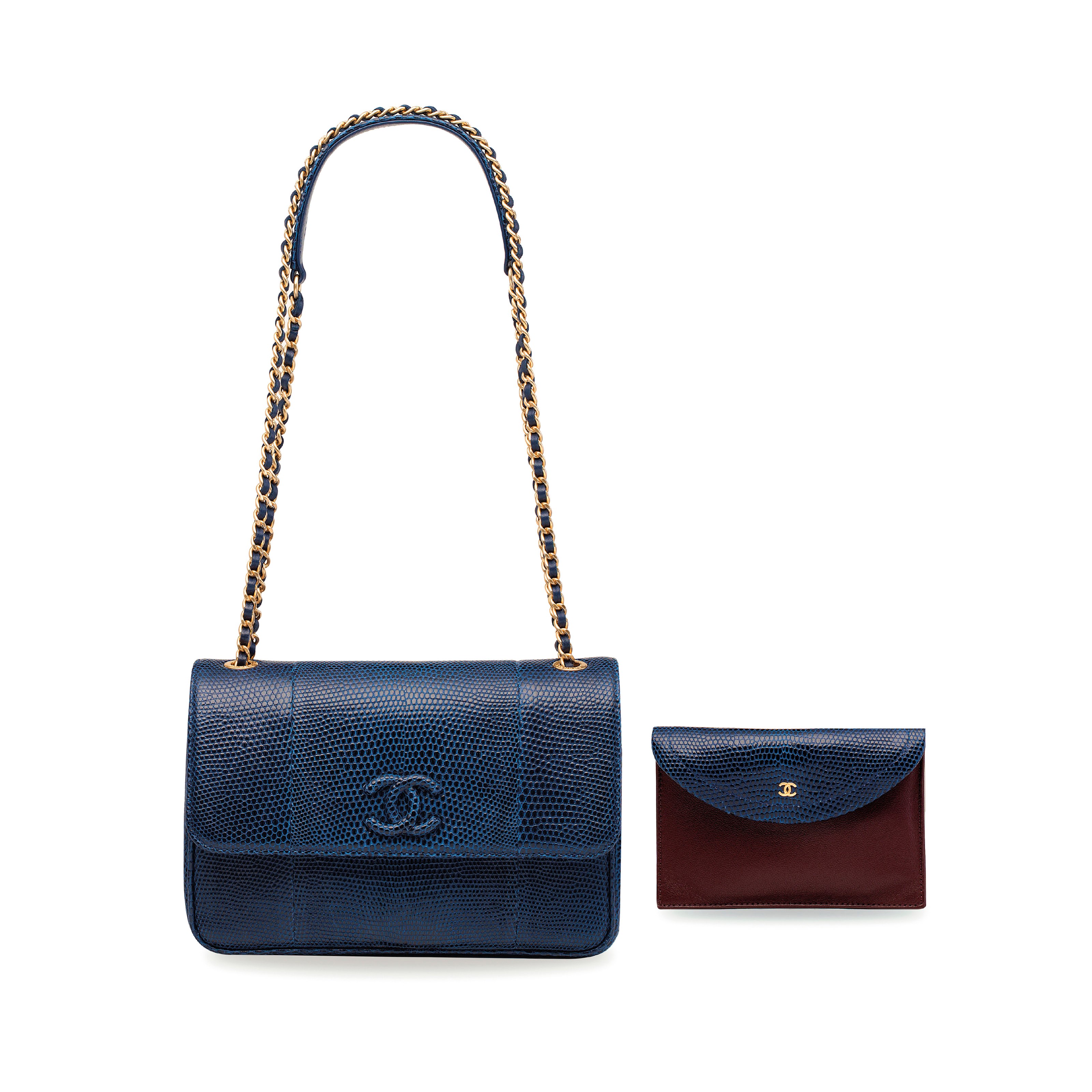 A SHINY BLUE LIZARD SINGLE FLAP BAG WITH GOLD HARDWARE AND INSERT