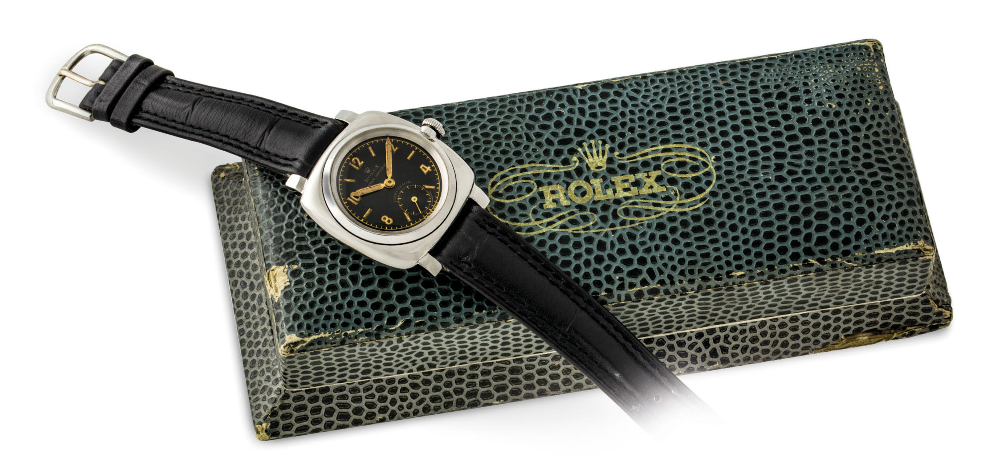 ROLEX. A RARE STAINLESS STEEL CUSHION-SHAPED WRISTWATCH