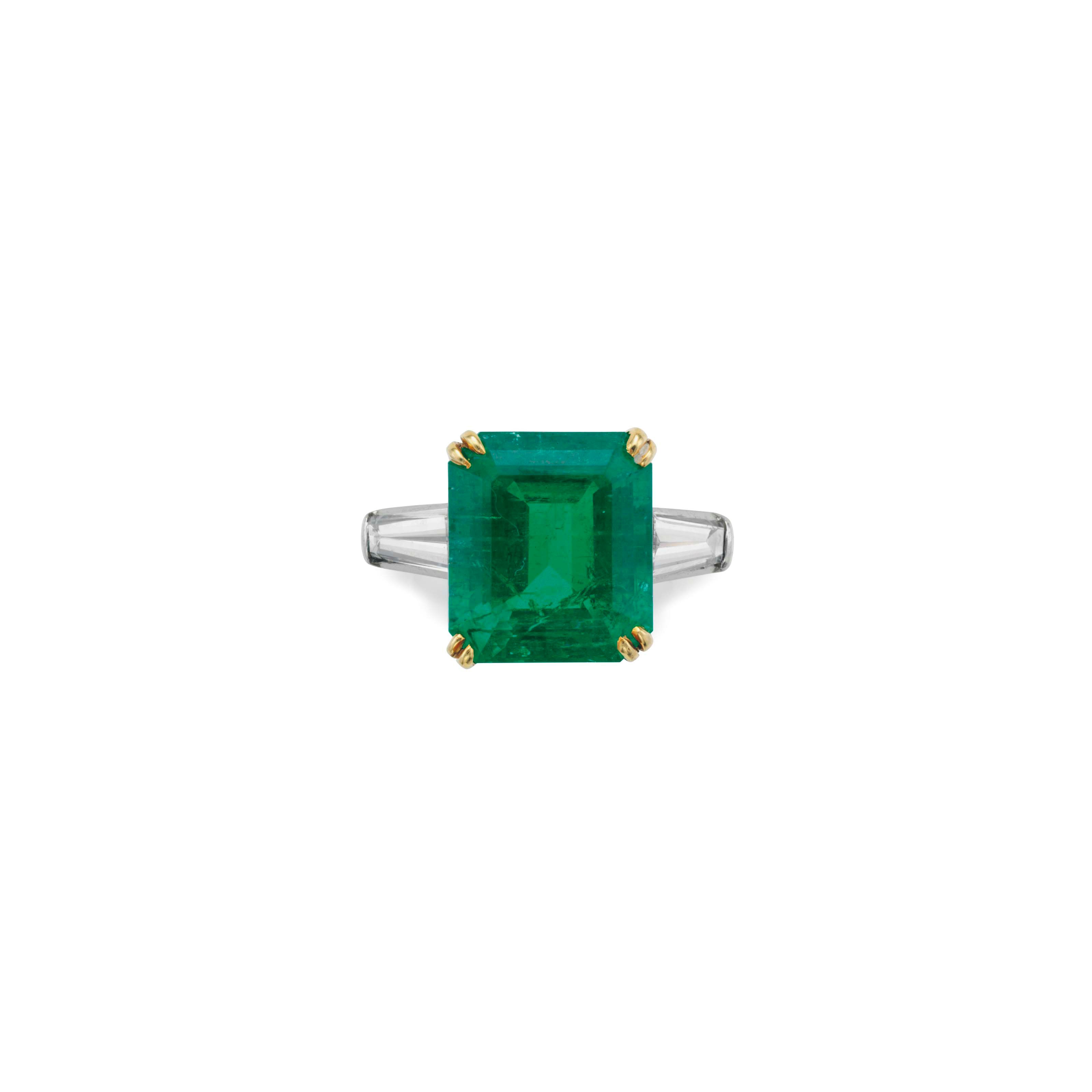 AN EMERALD AND DIAMOND RING