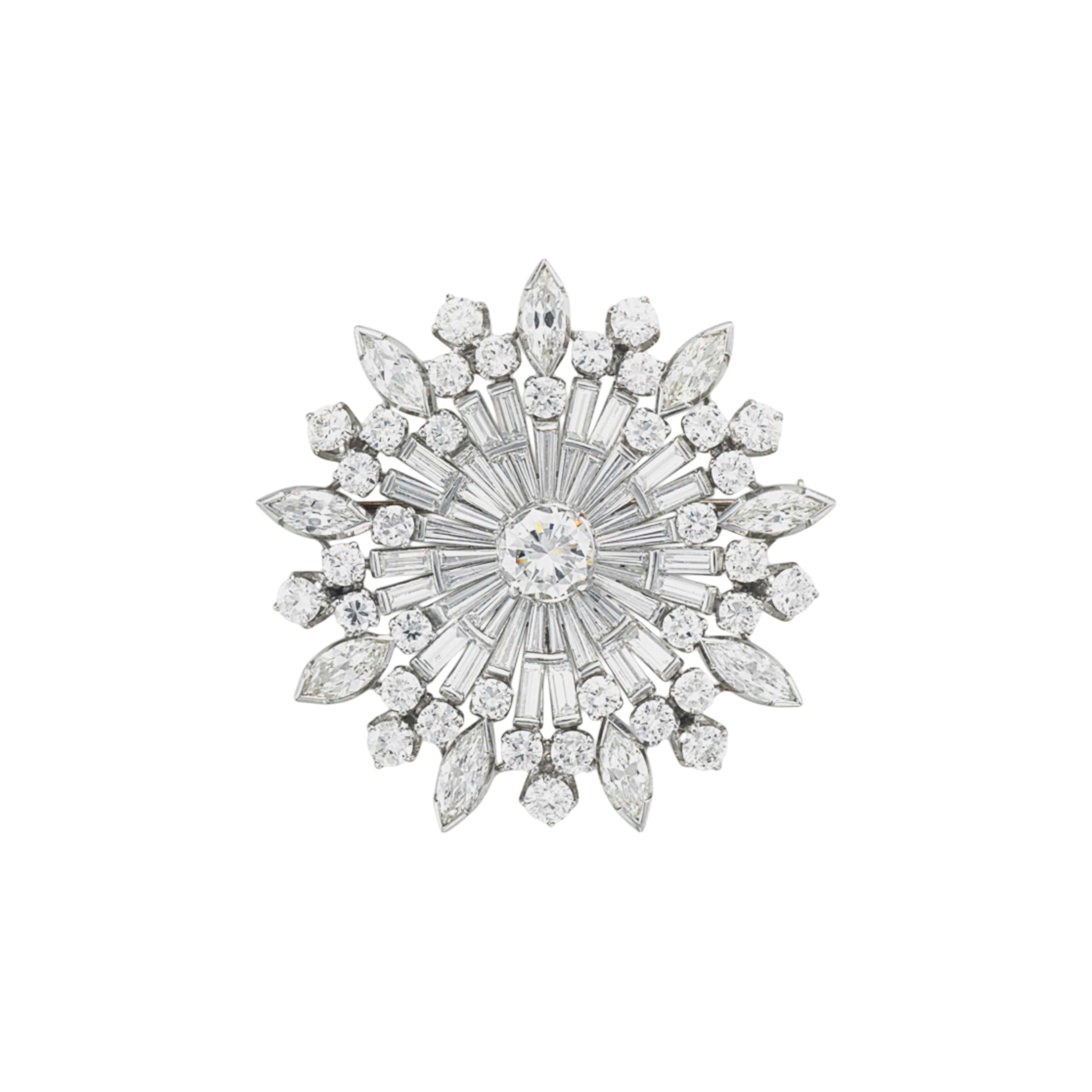 A DIAMOND PENDANT BROOCH