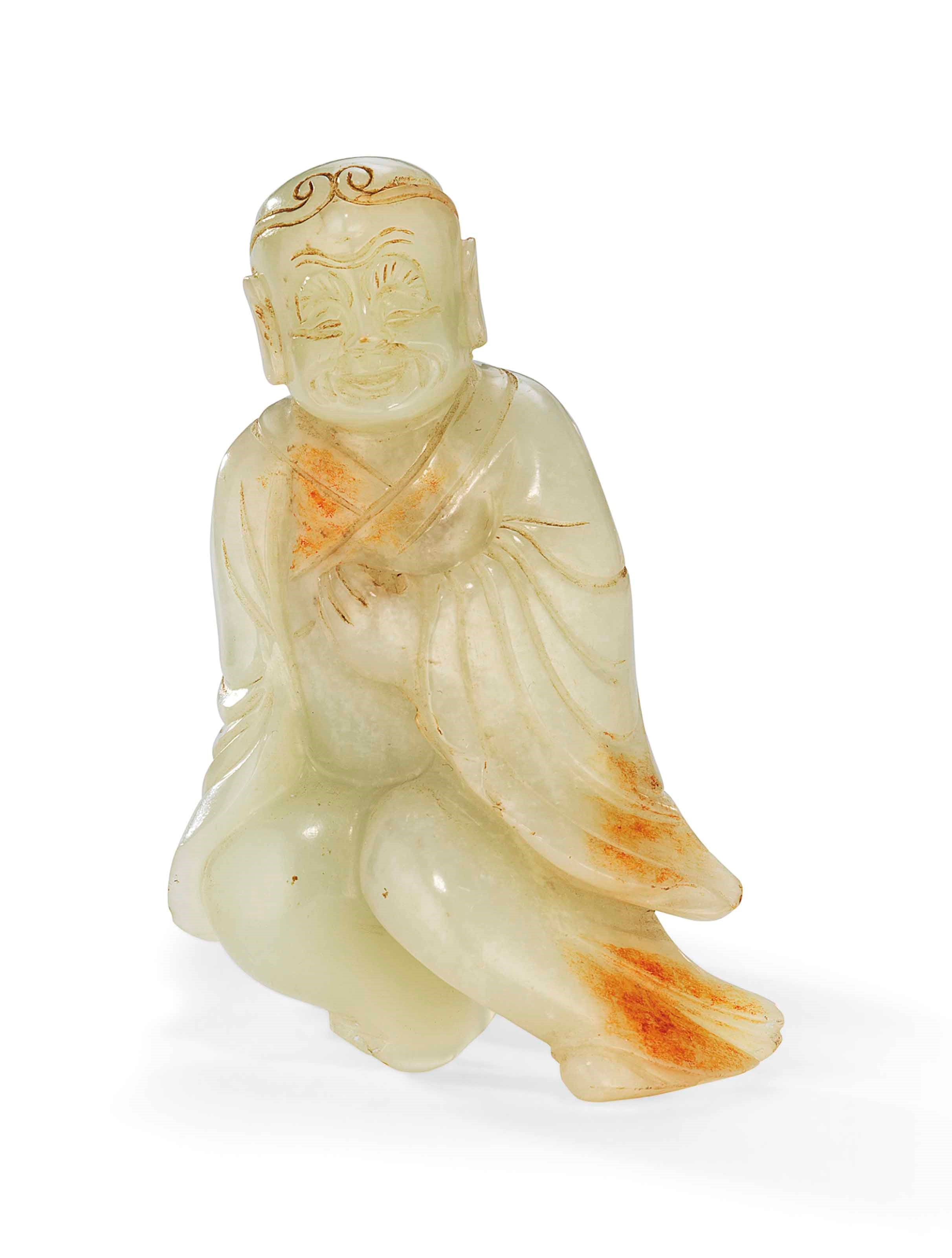 A CHINESE CELADON JADE CARVING OF A LUOHAN