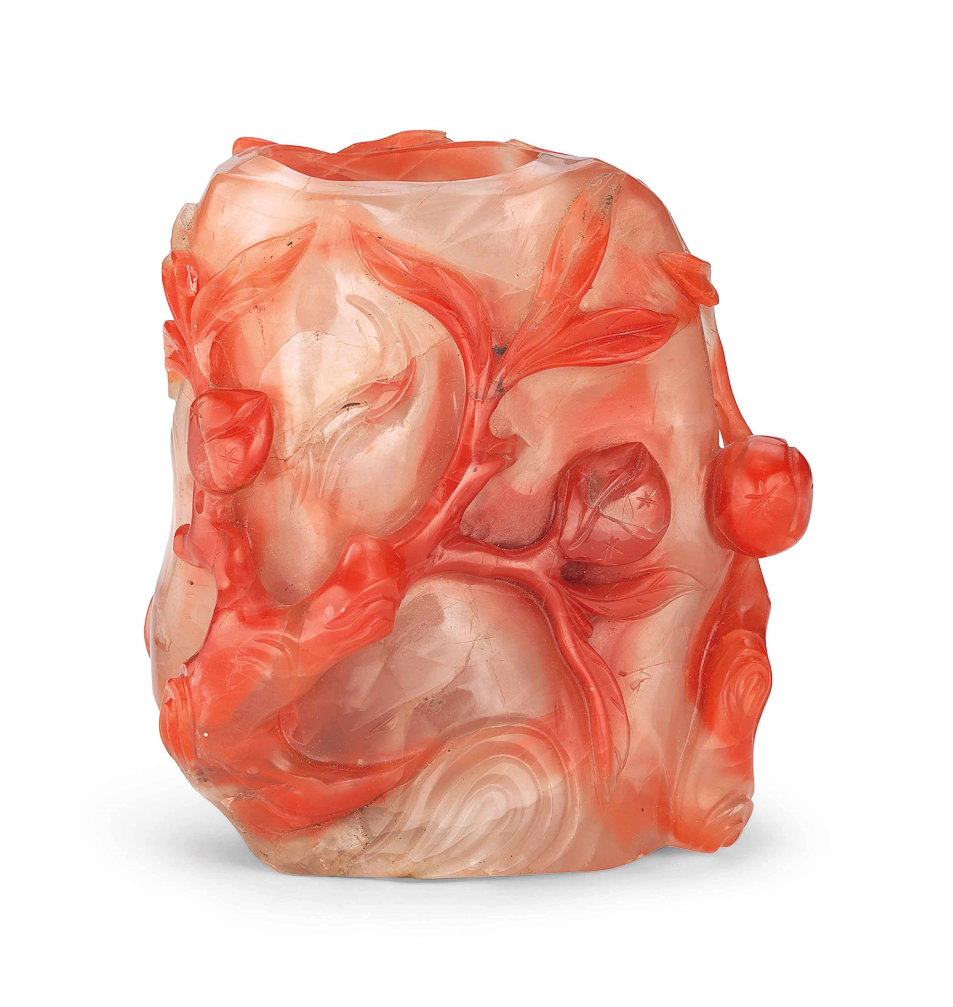 A CHINESE CARNELIAN AGATE TREE-TRUNK FORM BRUSHWASHER