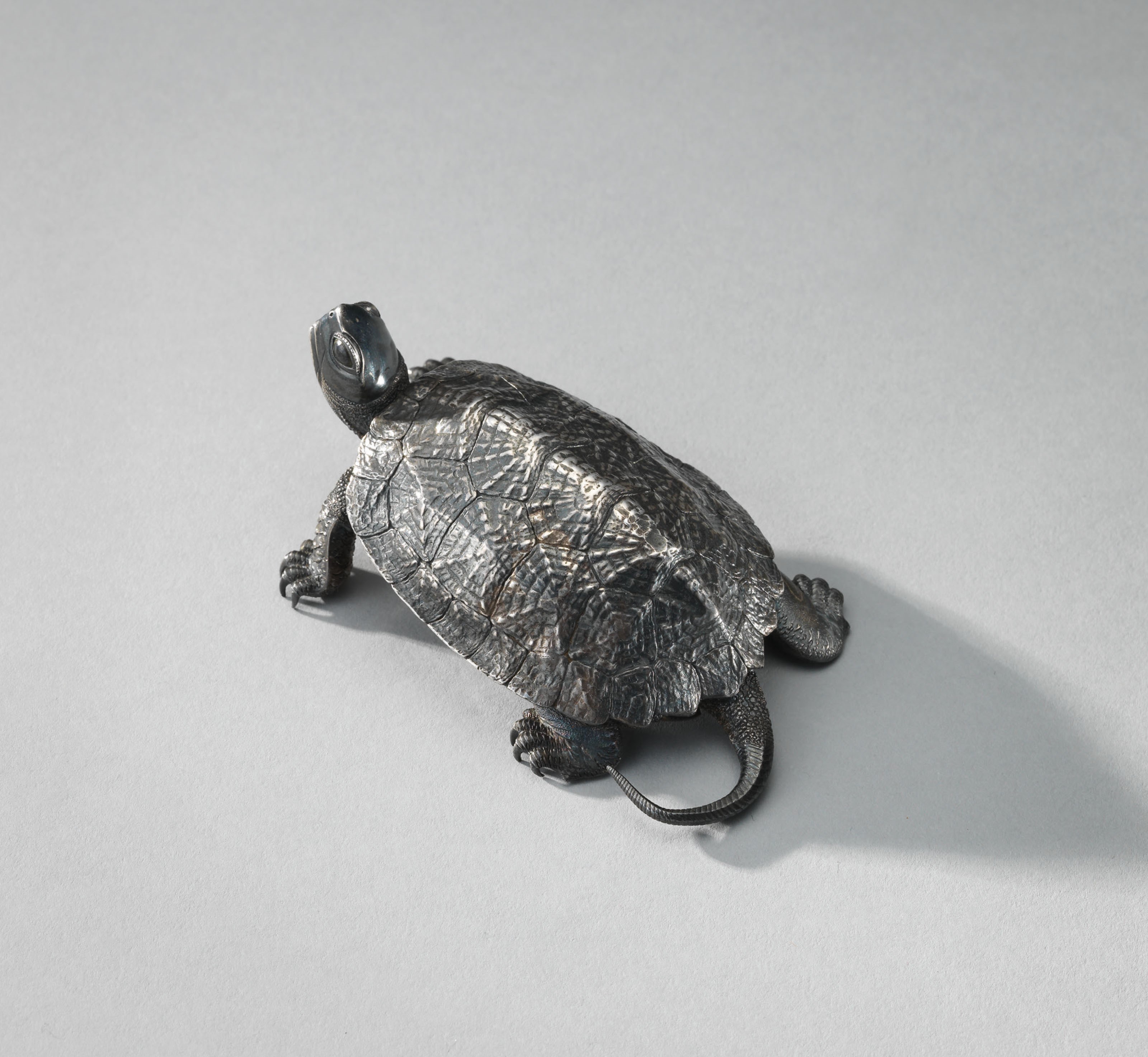 A MINIATURE SILVER MODEL OF A TORTOISE
