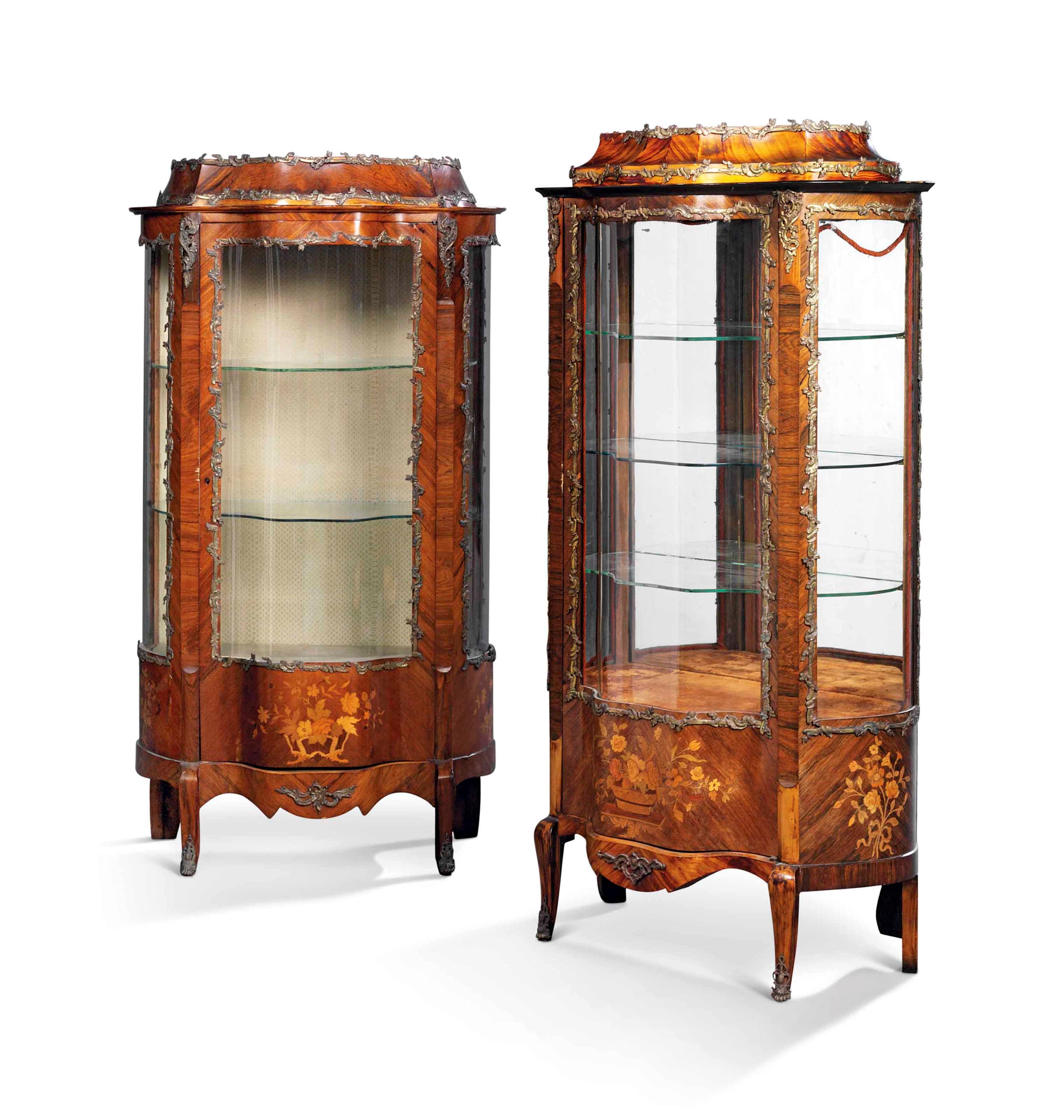 A MATCHED PAIR OF FRENCH BRASS-MOUNTED ROSEWOOD MARQUETRY SERPENTINE VITRINES