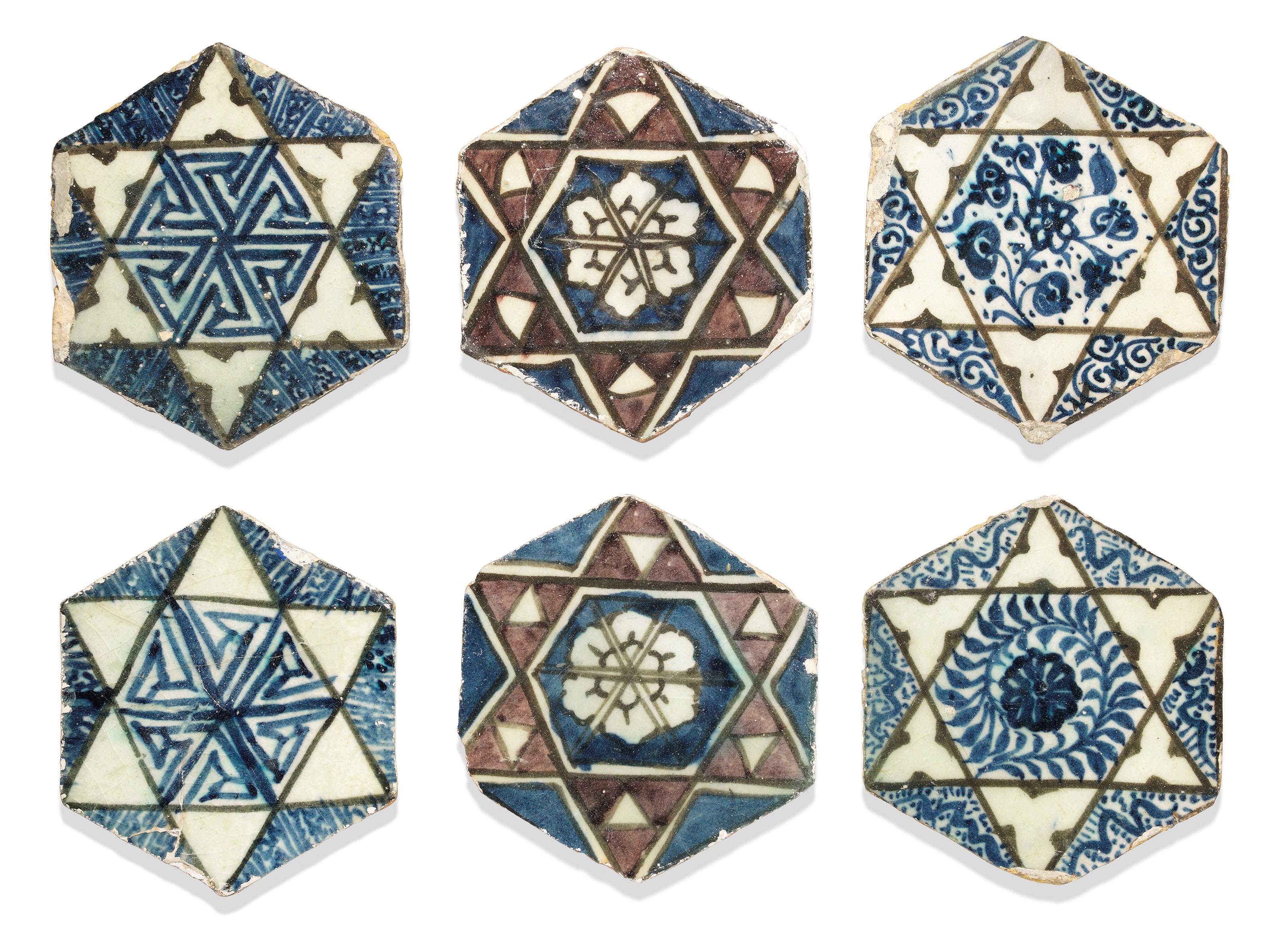 A GROUP OF SIX MAMLUK HEXAGONAL POTTERY TILES