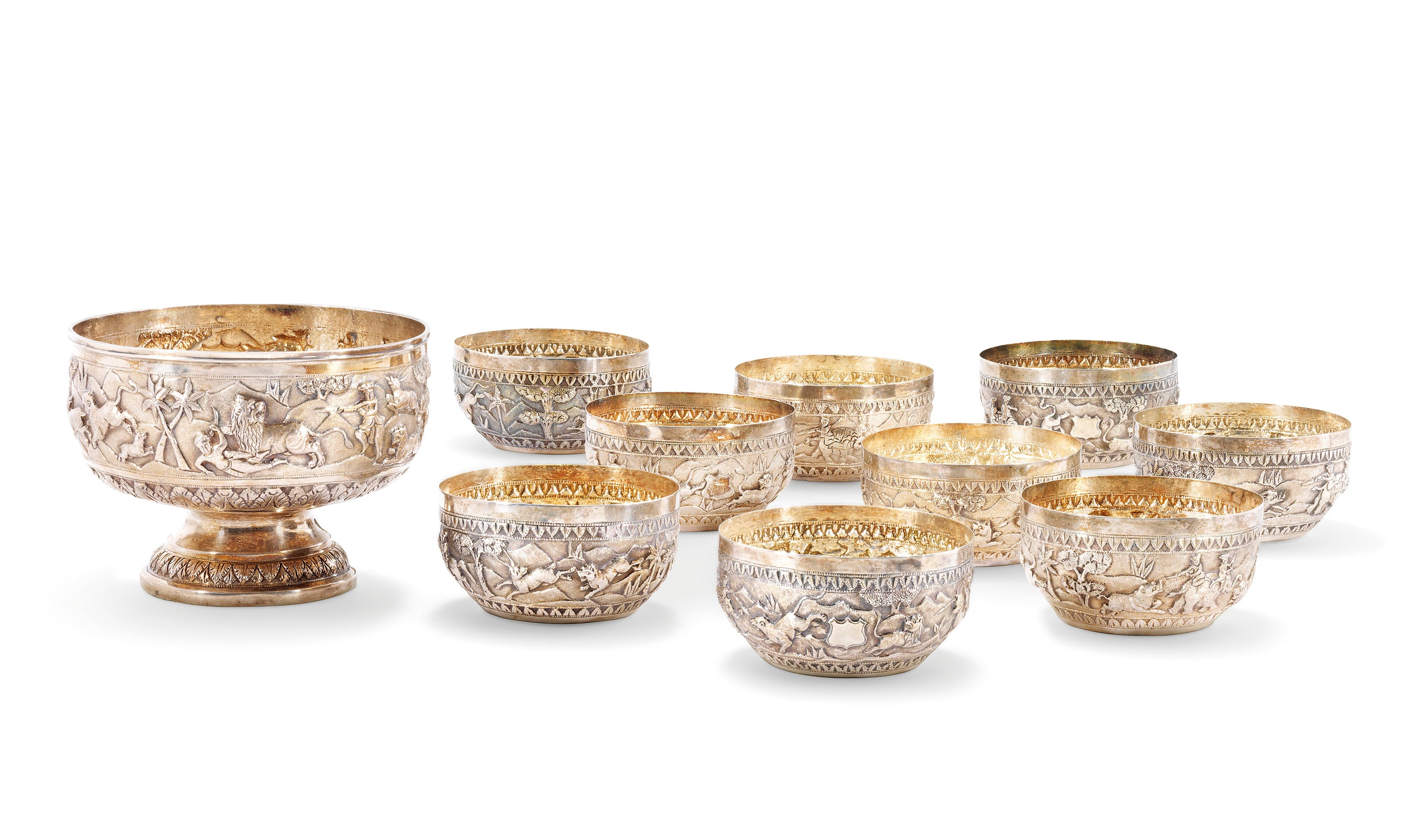 A GILT SILVER PUNCH SERVICE