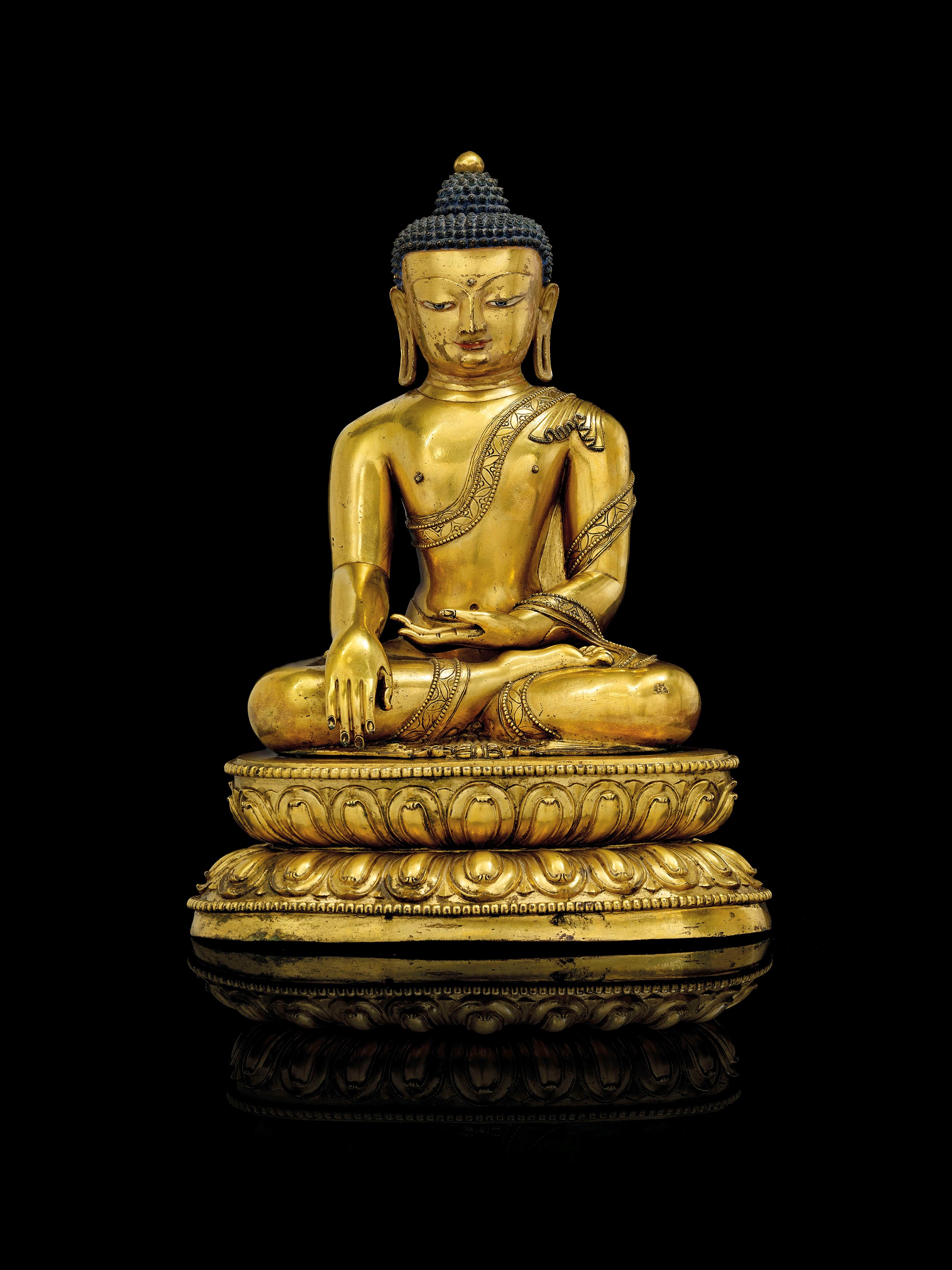 RARE ET IMPORTANTE STATUE DE BOUDDHA SHAKYAMUNI EN BRONZE DORE