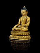 RARE ET IMPORTANTE STATUE DE BOUDDHA SHAKYAMUNI EN BRONZE DORE