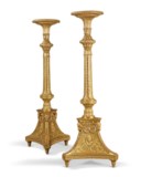A PAIR OF GEORGE III GILTWOOD TORCHERES