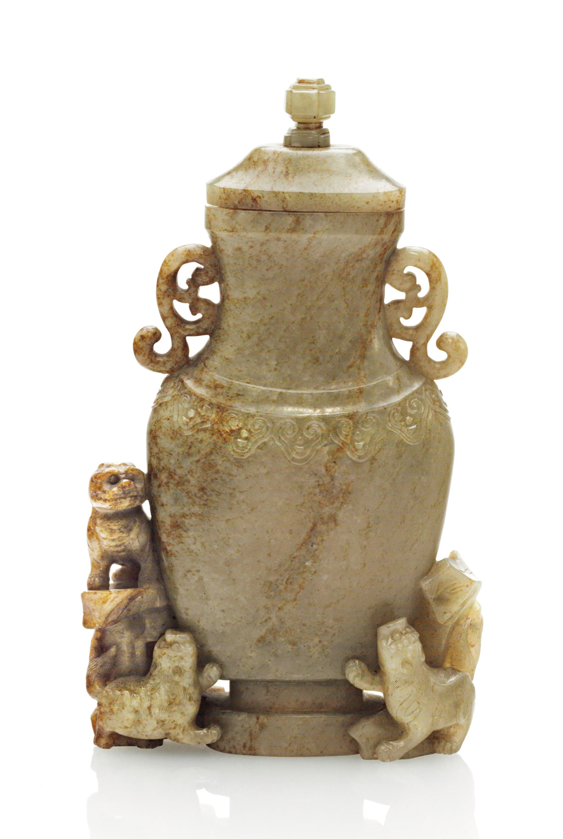 A GREYISH-WHITE AND RUSSET JADE VASE AND COVER