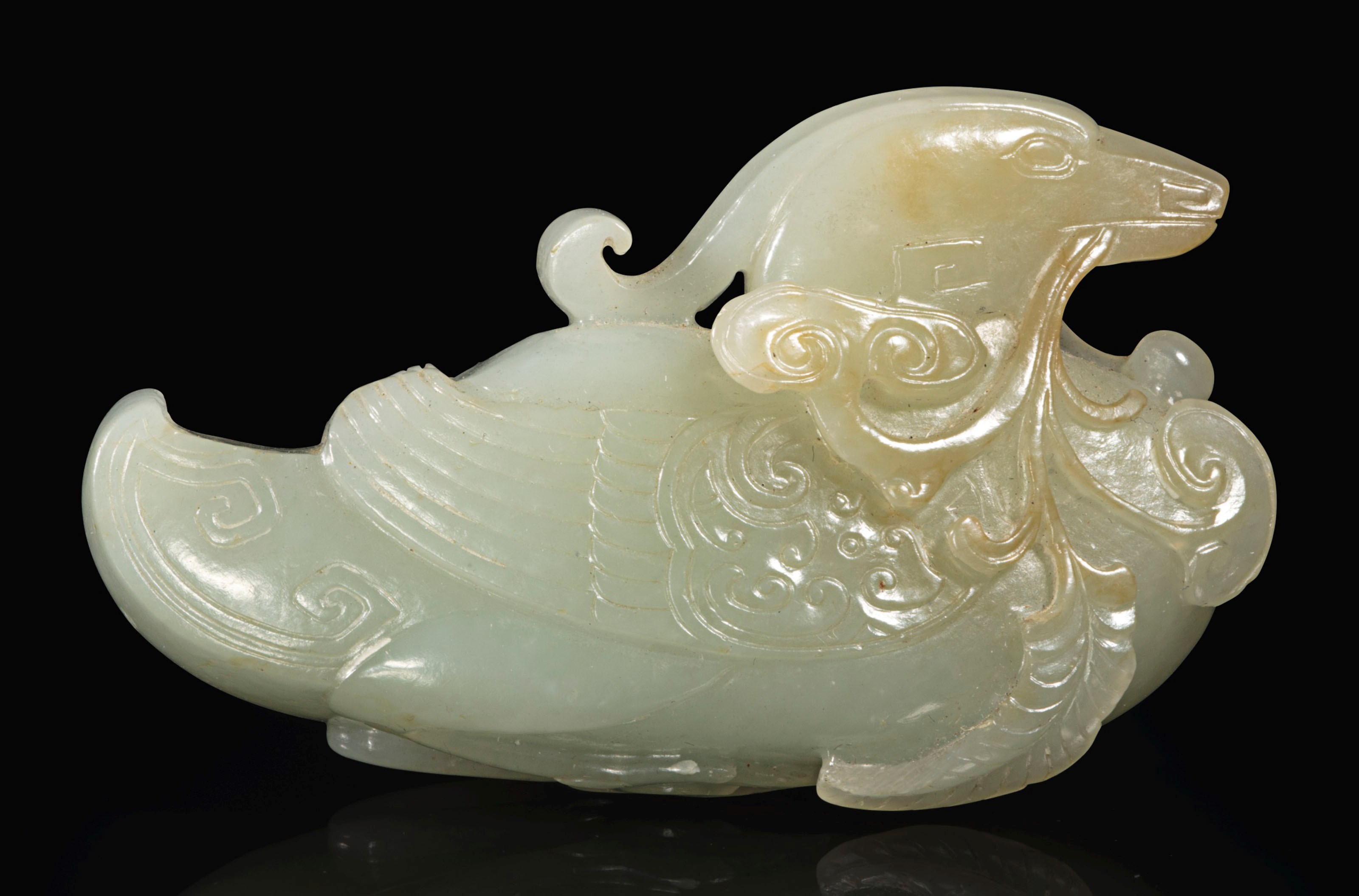 A PALE GREENISH-WHITE JADE FIGURE OF A DUCK
