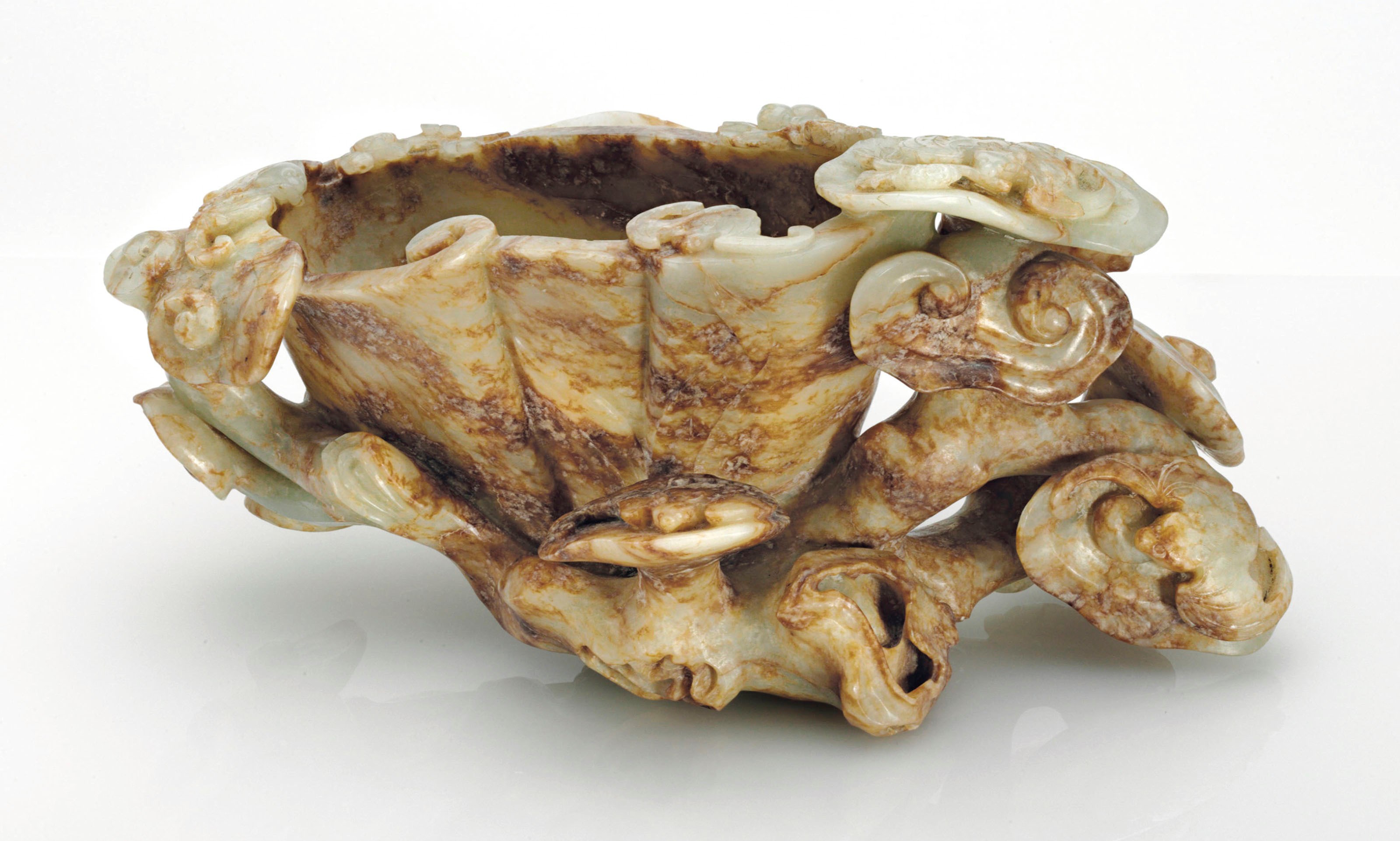 A LARGE PALE GREENISH-WHITE AND RUSSET JADE LINGZHI-FORM VESSEL