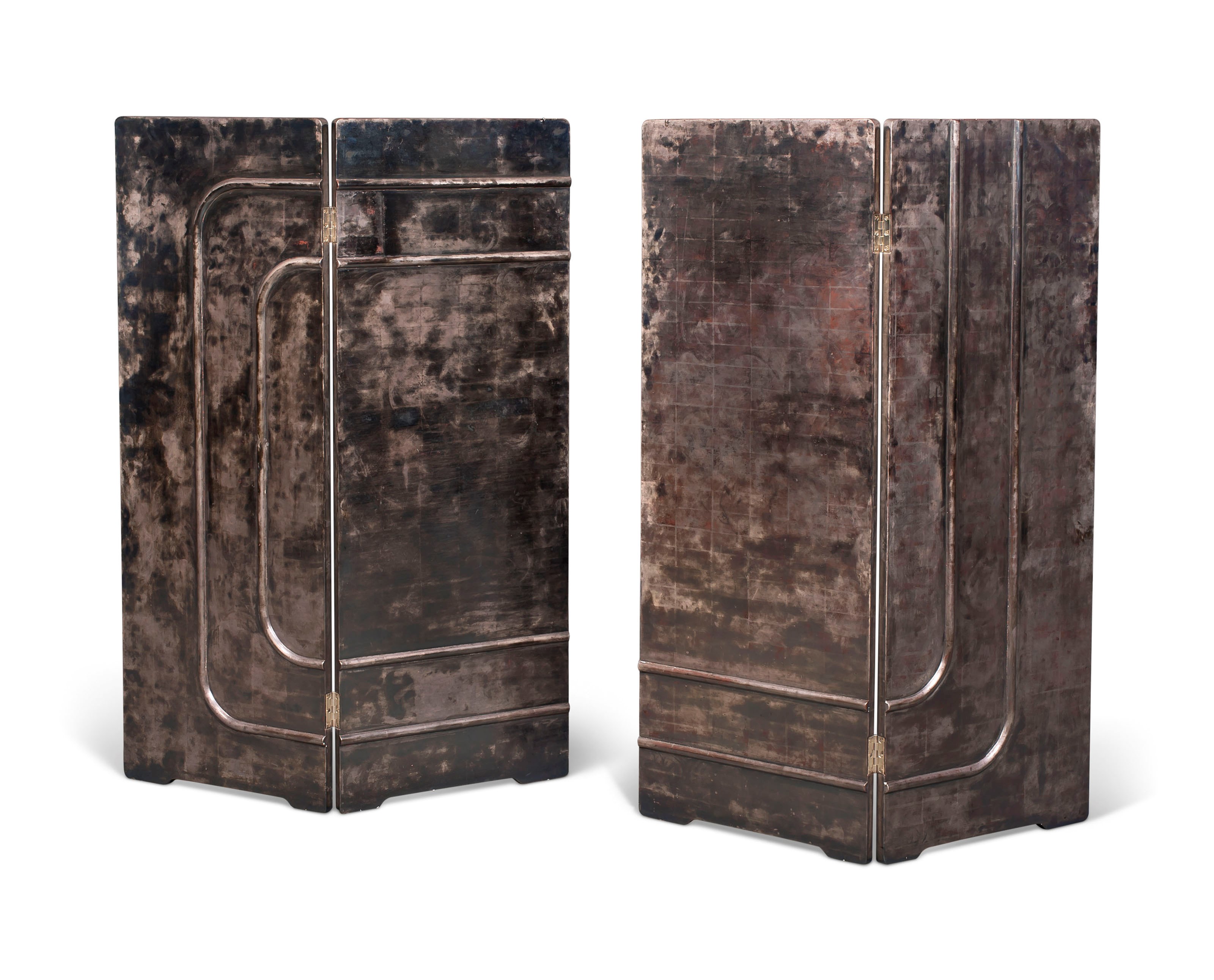 A PAIR OF SILVER-LACQUERED TWO-FOLD SCREENS