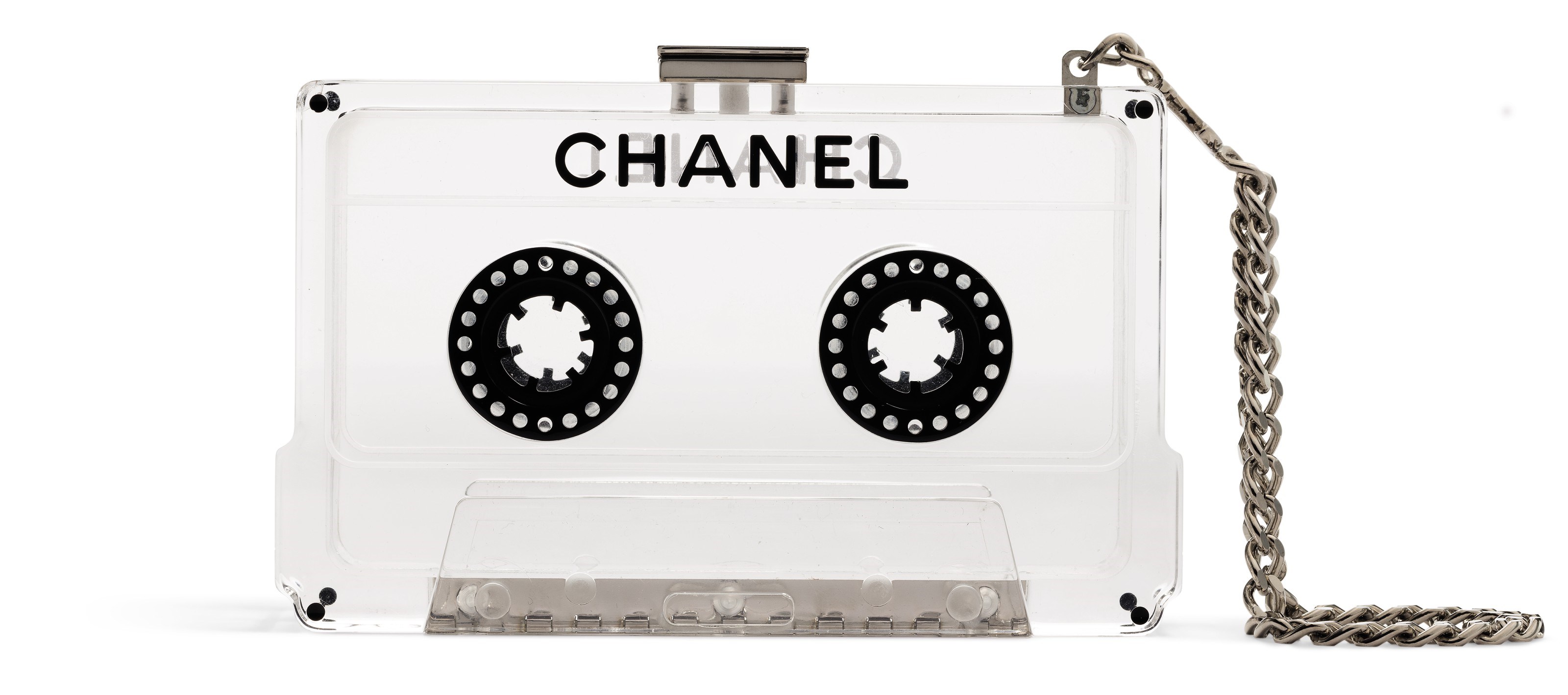 A CLEAR LUCITE CASSETTE EVENING CLUTCH WITH SILVER HARDWARE