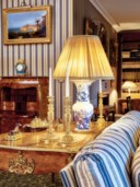 A LOUIS XV ORMOLU-MOUNTED TULIPWOOD AND KINGWOOD BUREAU-PLAT