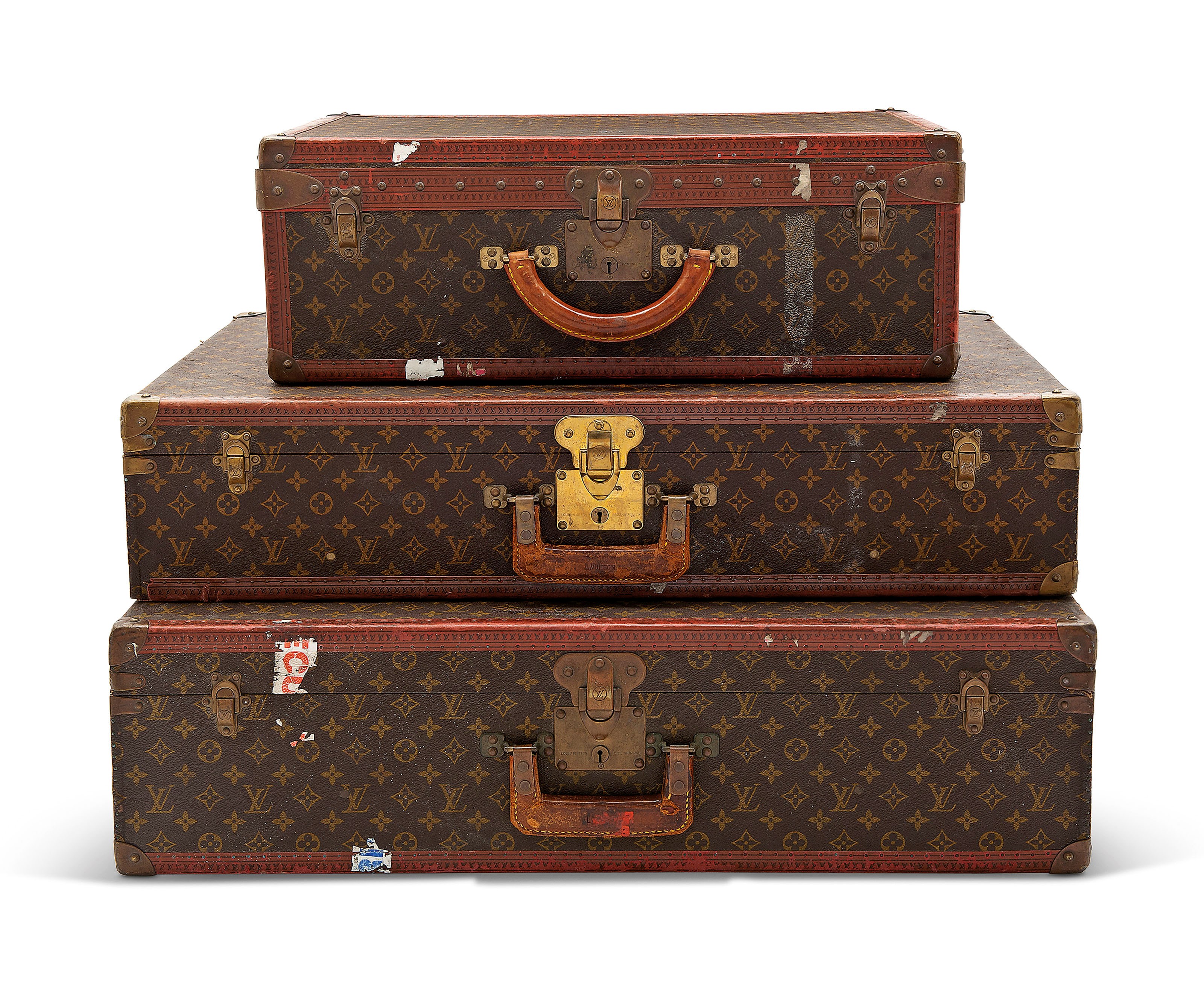 A SET OF THREE CLASSIC MONOGRAM CANVAS HARDSIDED SUITCASE TRUNKS