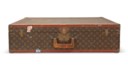 A SET OF THREE CLASSIC MONOGRAM CANVAS HARDSIDED SUITCASE TRUNKS