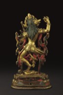 A GILT-BRONZE FIGURE OF VAJRAVARAHI