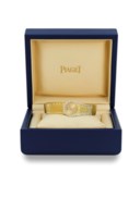 PIAGET. AN ATTRACTIVE AND ELEGANT 18K GOLD ASYMMETRIC DIAMOND-SET BRACELET WATCH