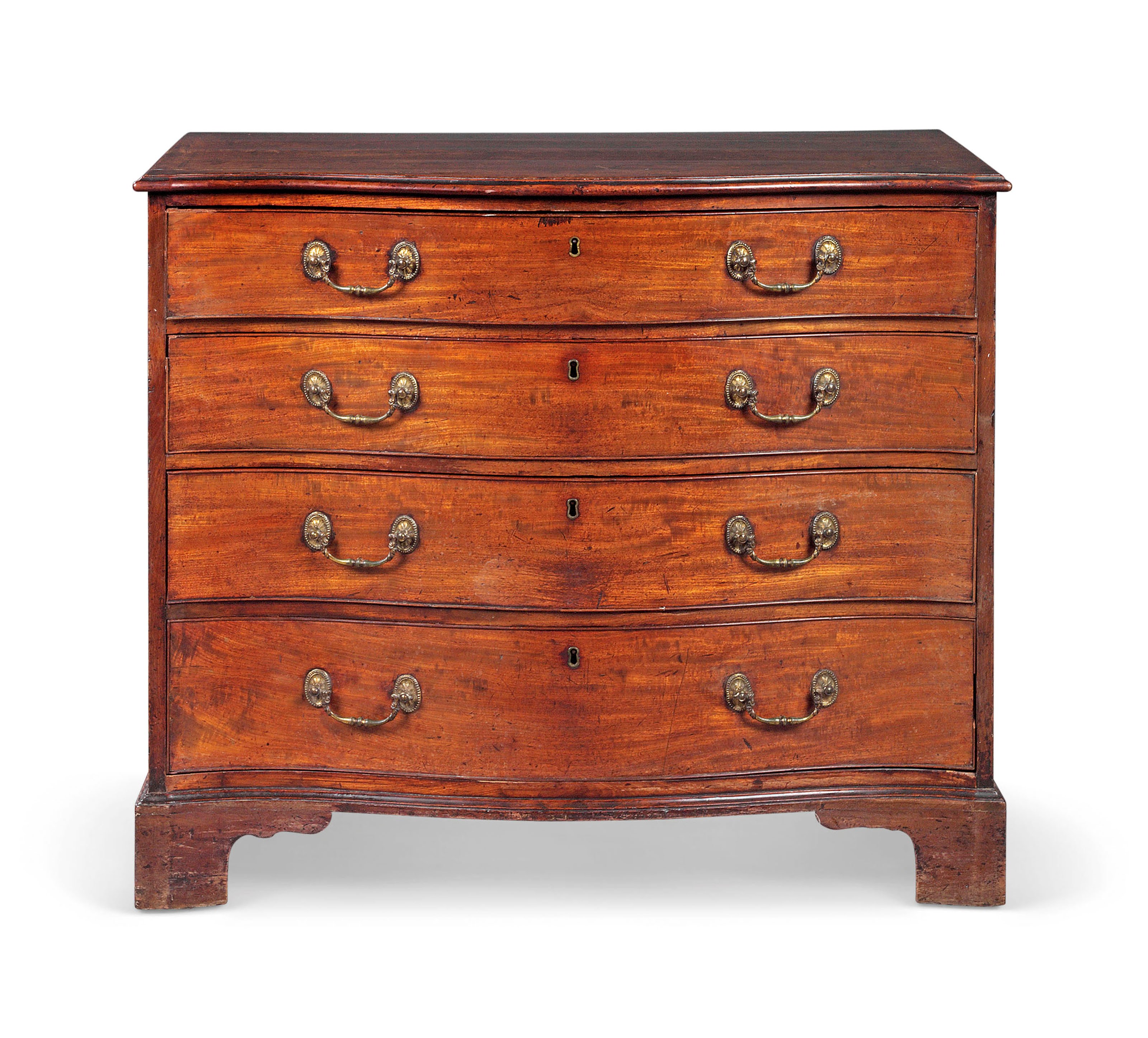 A GEORGE III MAHOGANY SERPENTINE DRESSING-CHEST