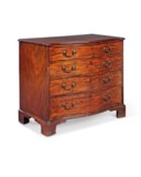 A GEORGE III MAHOGANY SERPENTINE DRESSING-CHEST