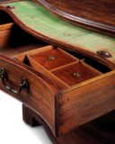 A GEORGE III MAHOGANY SERPENTINE DRESSING-CHEST