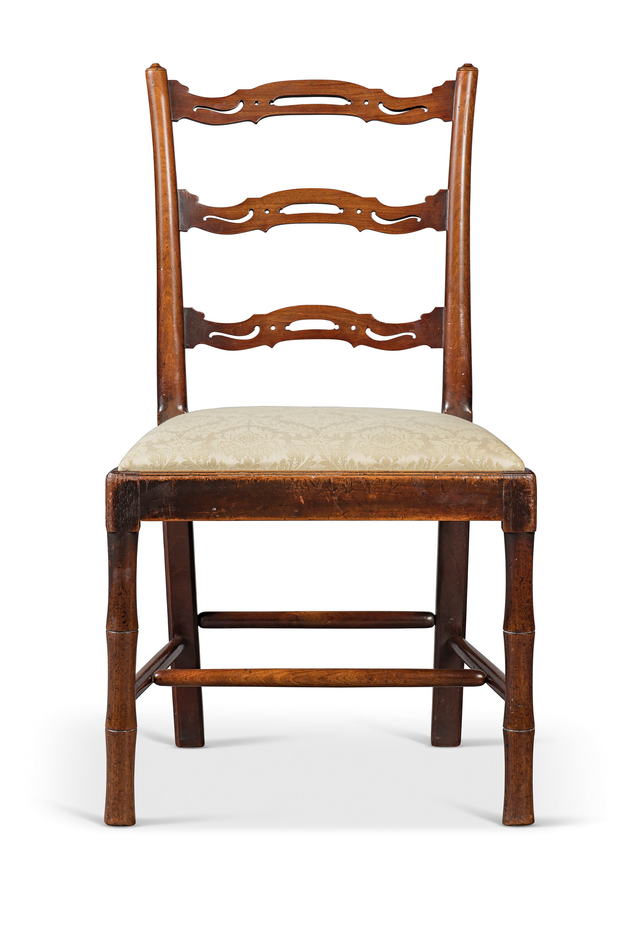 A SET OF SIXTEEN GEORGE III MAHOGANY `FIDDLE-BACK' DINING-CHAIRS