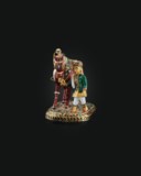 AN ENAMELLED AND DIAMOND-SET MODEL OF A HORSE AND GROOM