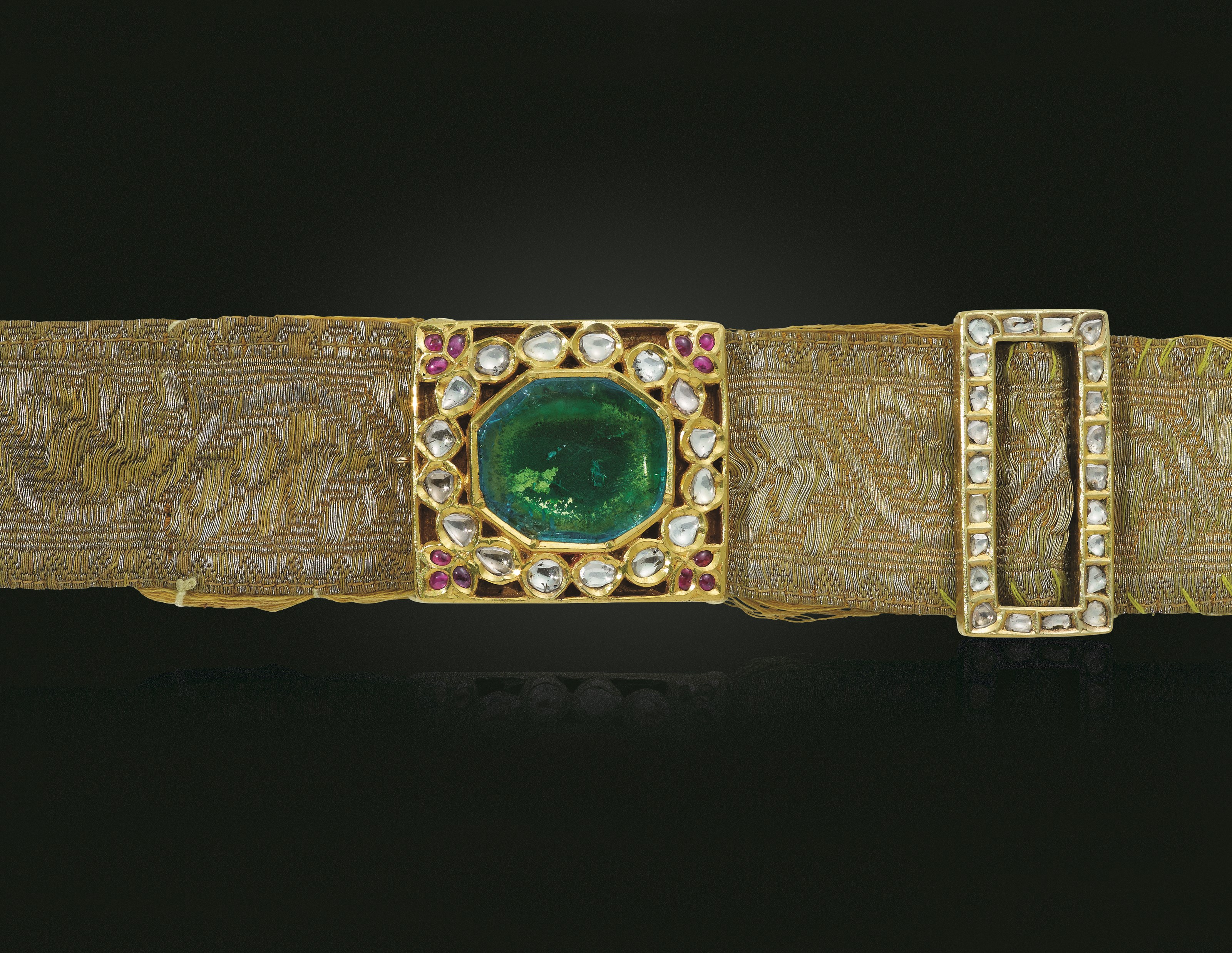 AN ANTIQUE EMERALD, DIAMOND, RUBY AND SILK BELT