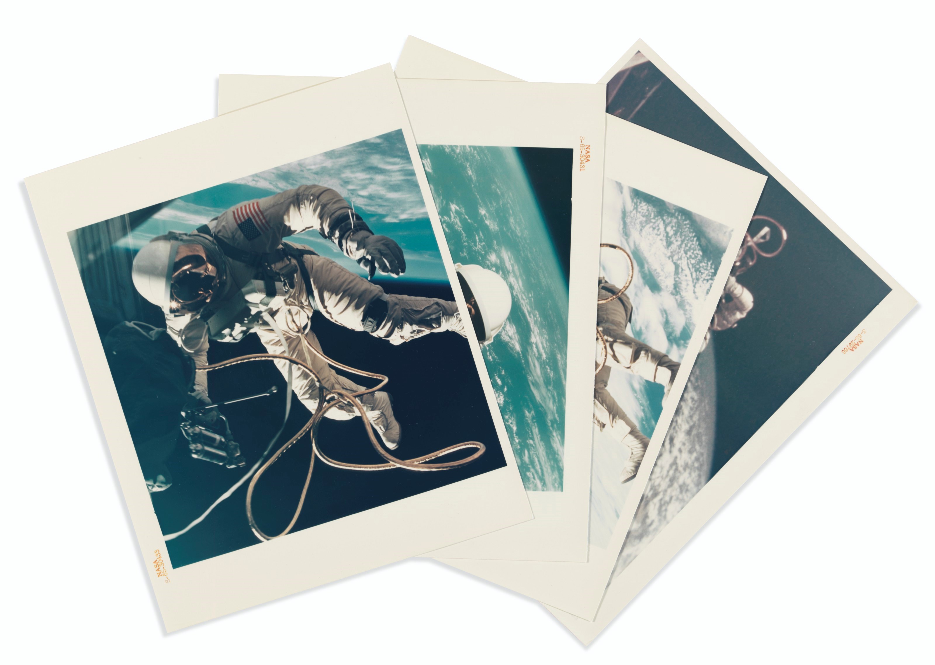 GEMINI 4 SPACEWALK PHOTOGRAPHS. Four photographs. 1965.
