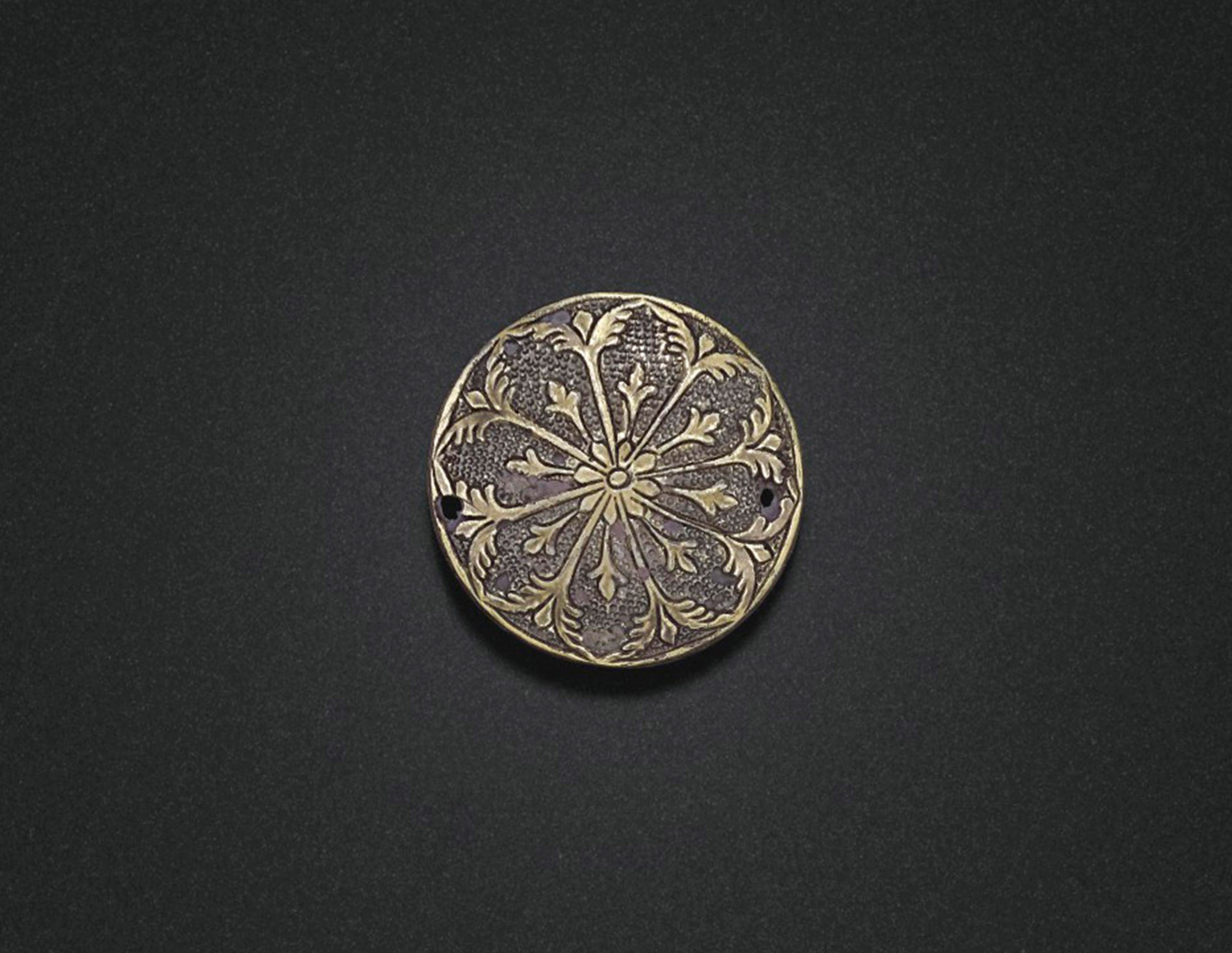 A MINIATURE CIRCULAR PARCEL-GILT SILVER BOX AND COVER