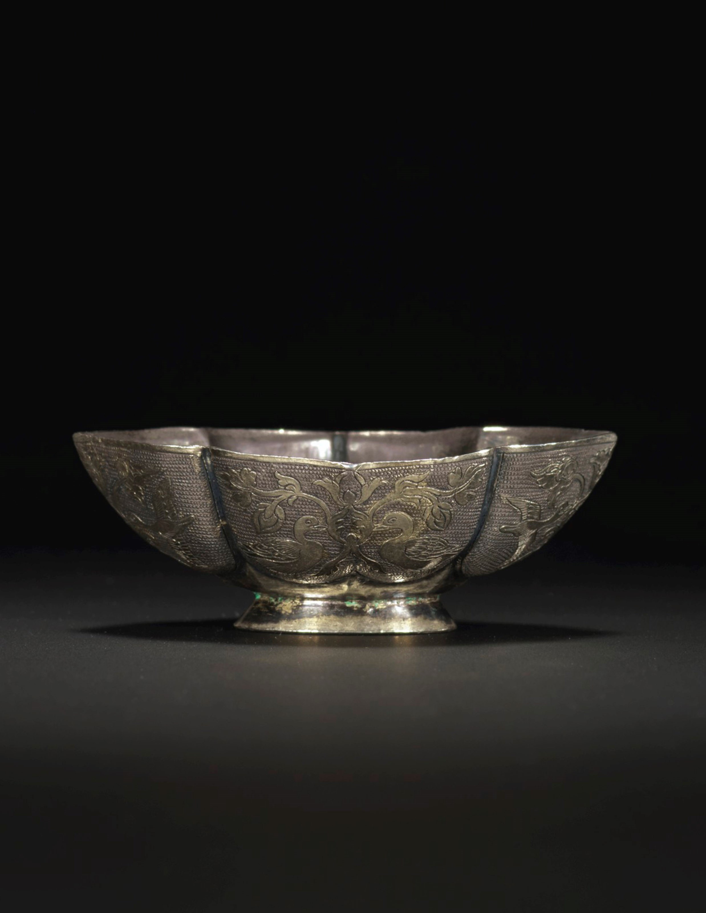 A FINE SMALL PARCEL-GILT SILVER QUATREFOIL CUP