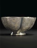 A FINE SMALL PARCEL-GILT SILVER QUATREFOIL CUP