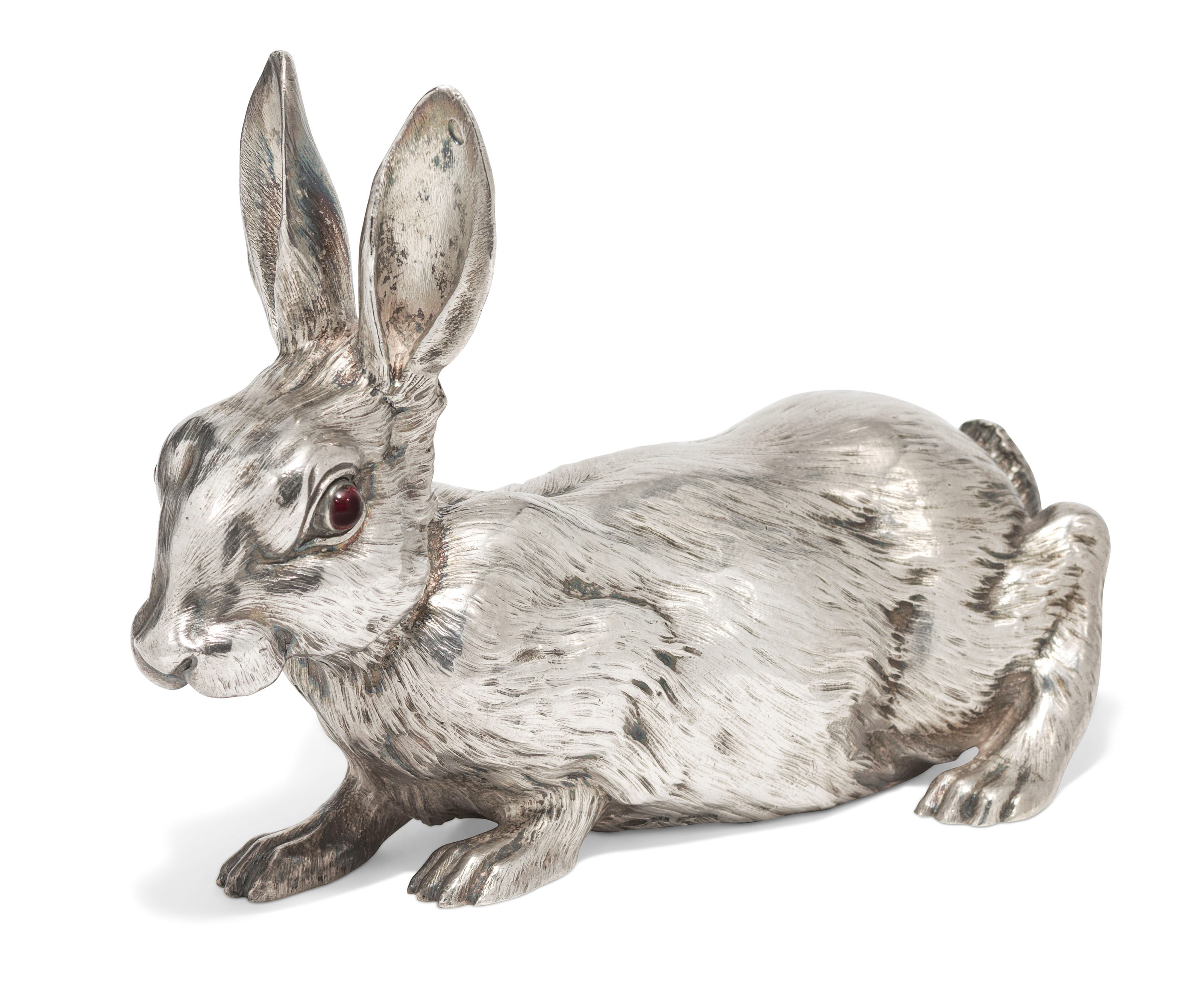 A GEM-SET SILVER BELL-PUSH IN THE FORM OF A RABBIT