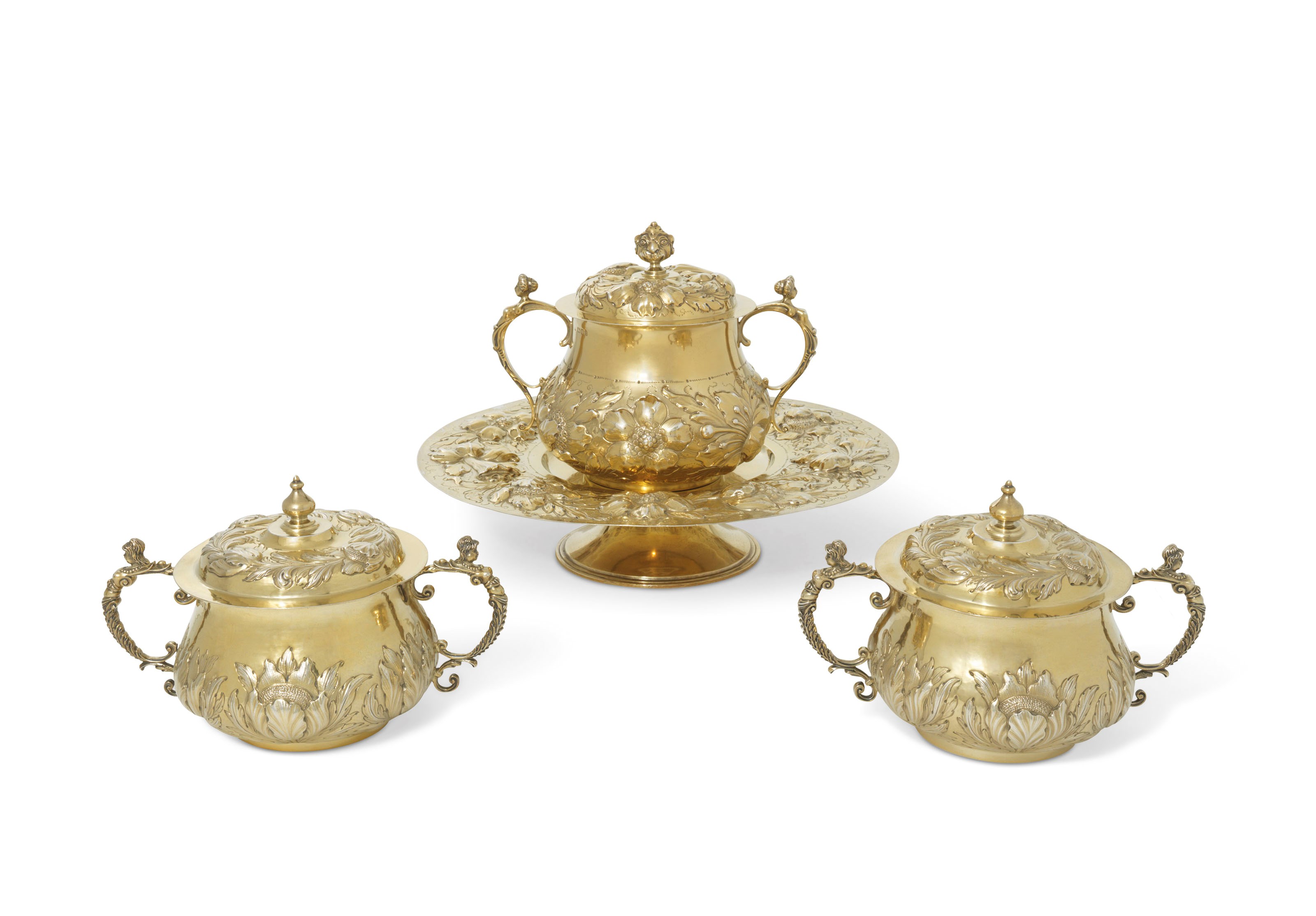 AN EDWARD VII PAIR OF SILVER-GILT PORRINGERS AND COVERS AND A GEORGE V SILVER-GILT PORRINGER, COVER AND TAZZA
