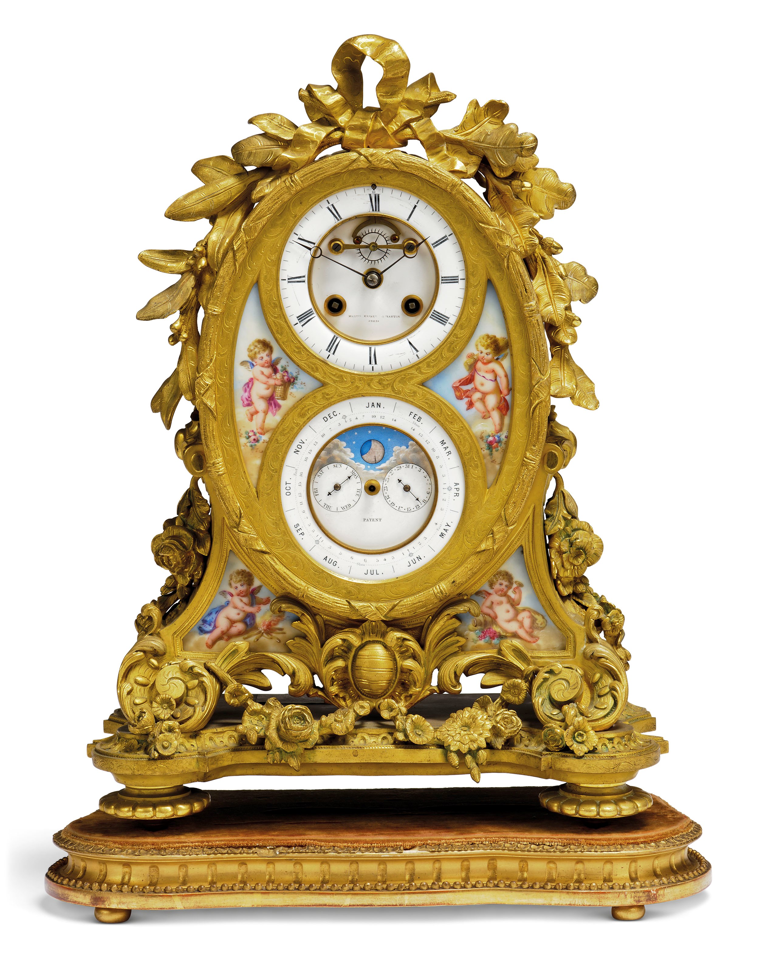 A VICTORIAN ORMOLU AND PORCELAIN STRIKING MANTEL CLOCK WITH CALENDAR