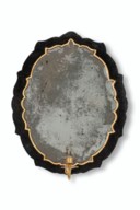 SEVEN ITALIAN EBONISED AND PARCEL-GILT GIRANDOLE MIRRORS