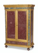 AN ITALIAN GILT-BRONZE, PORPHYRY, LAPIS LAZULI AND HARDSTONE-MOUNTED COLLECTOR'S CABINET